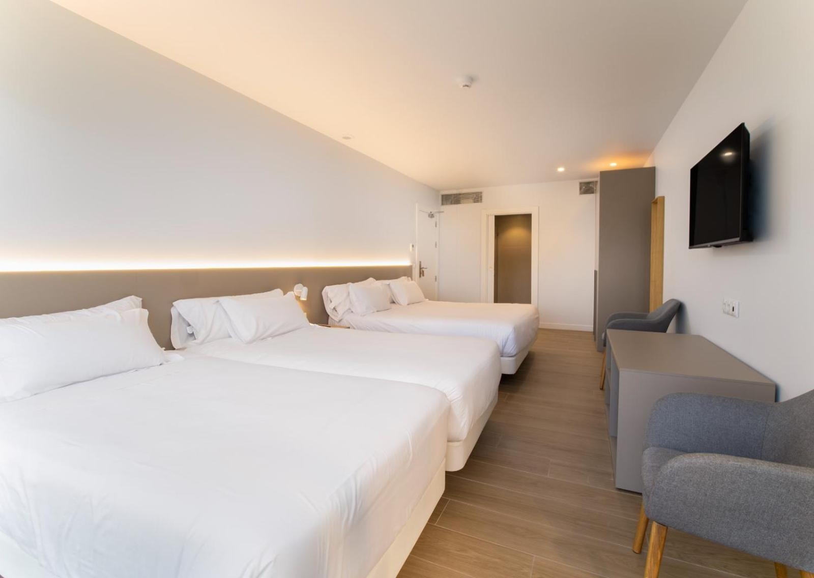 Habitación Triple con Balcón