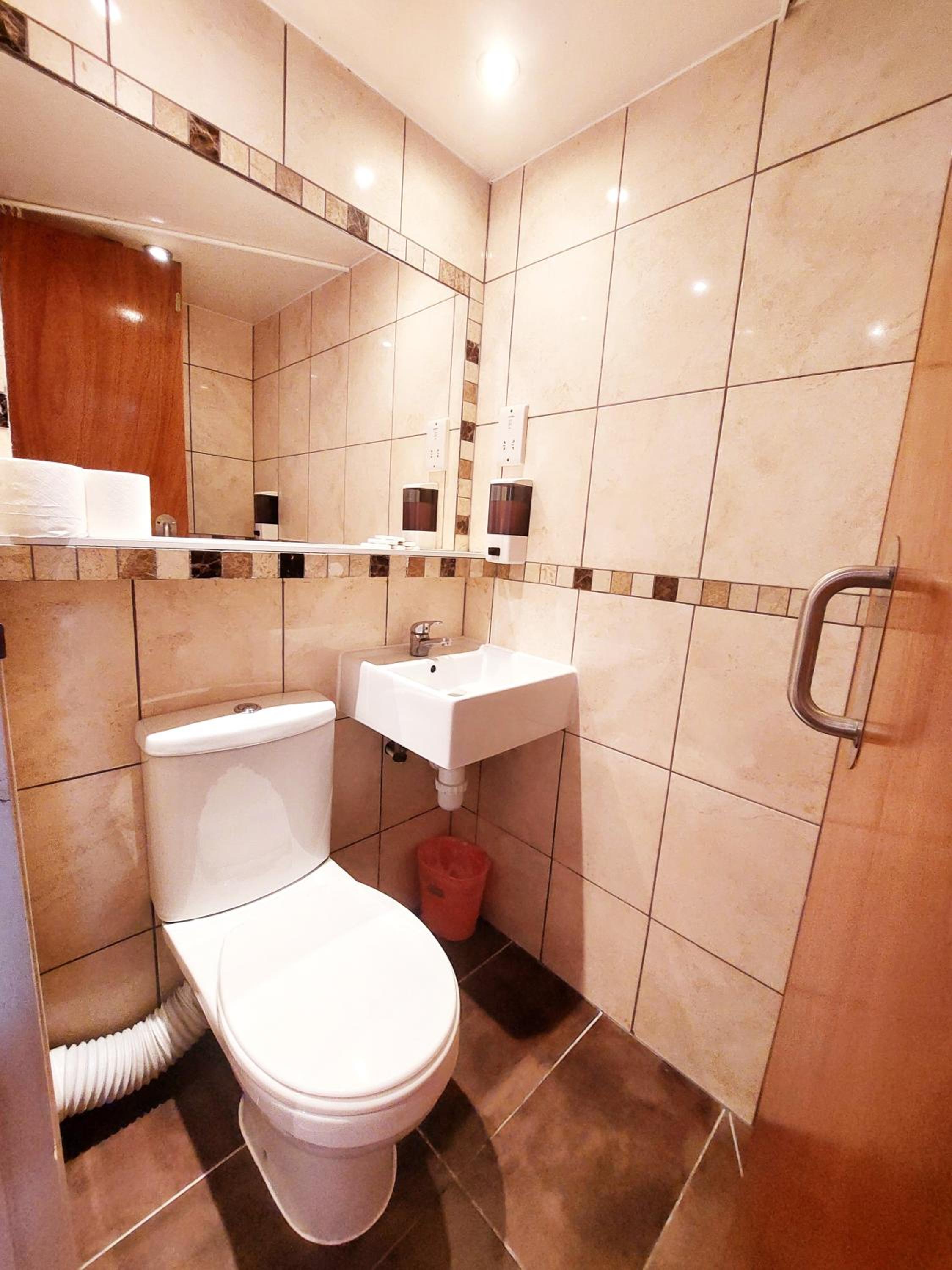 Family Room with private toilet and shower photo 2