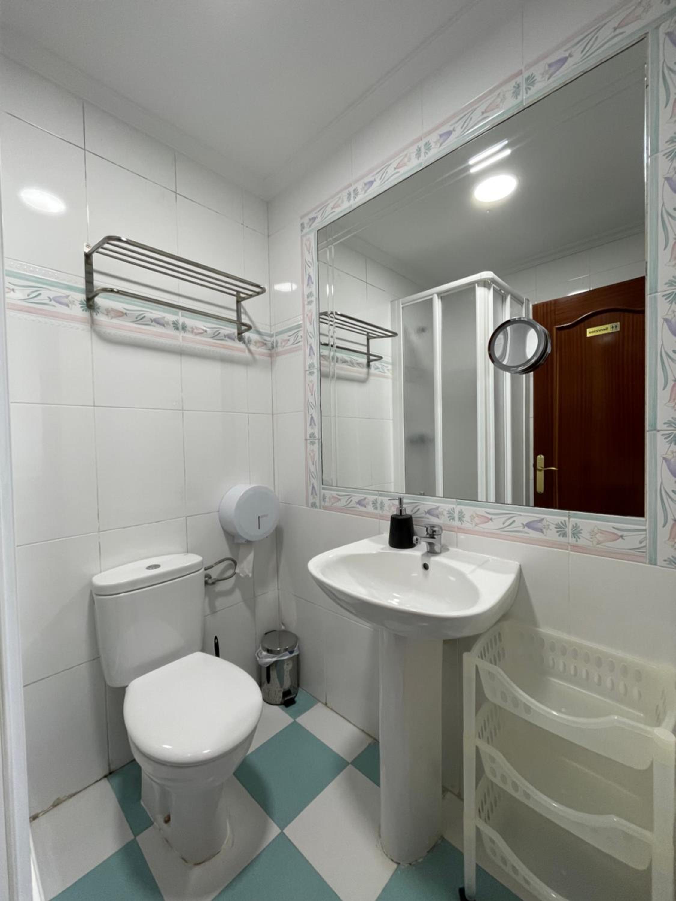 Basic Triple Room with Shared Bathroom photo 2