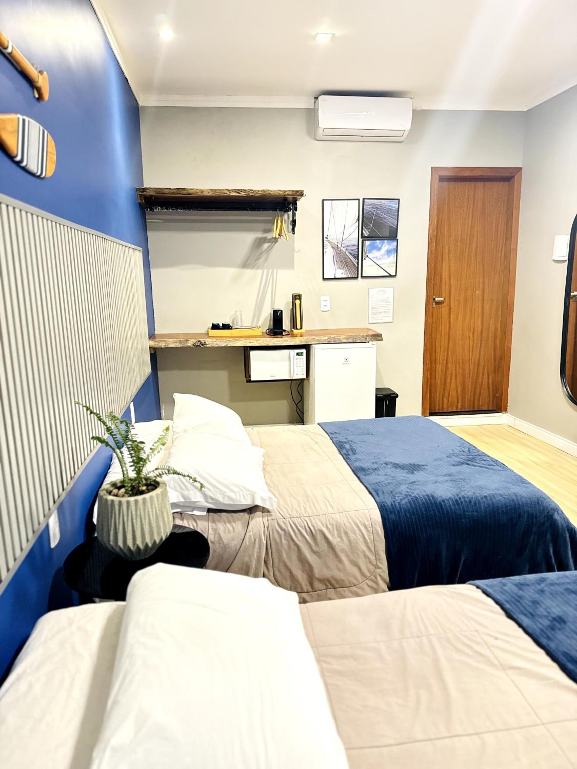 Deluxe Queen Room with Two Queen Beds - Photo 13