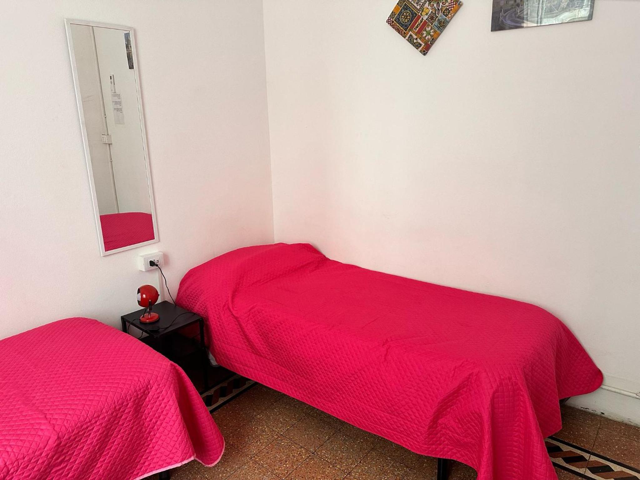 Single Bed In Female Dormitory Room