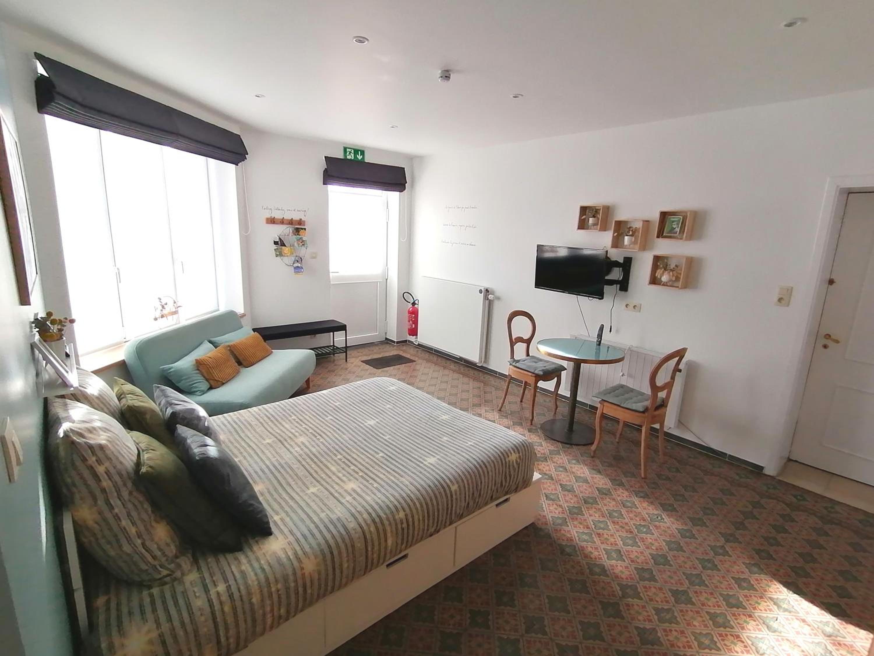 Quadruple Room with Private Bathroom photo 1