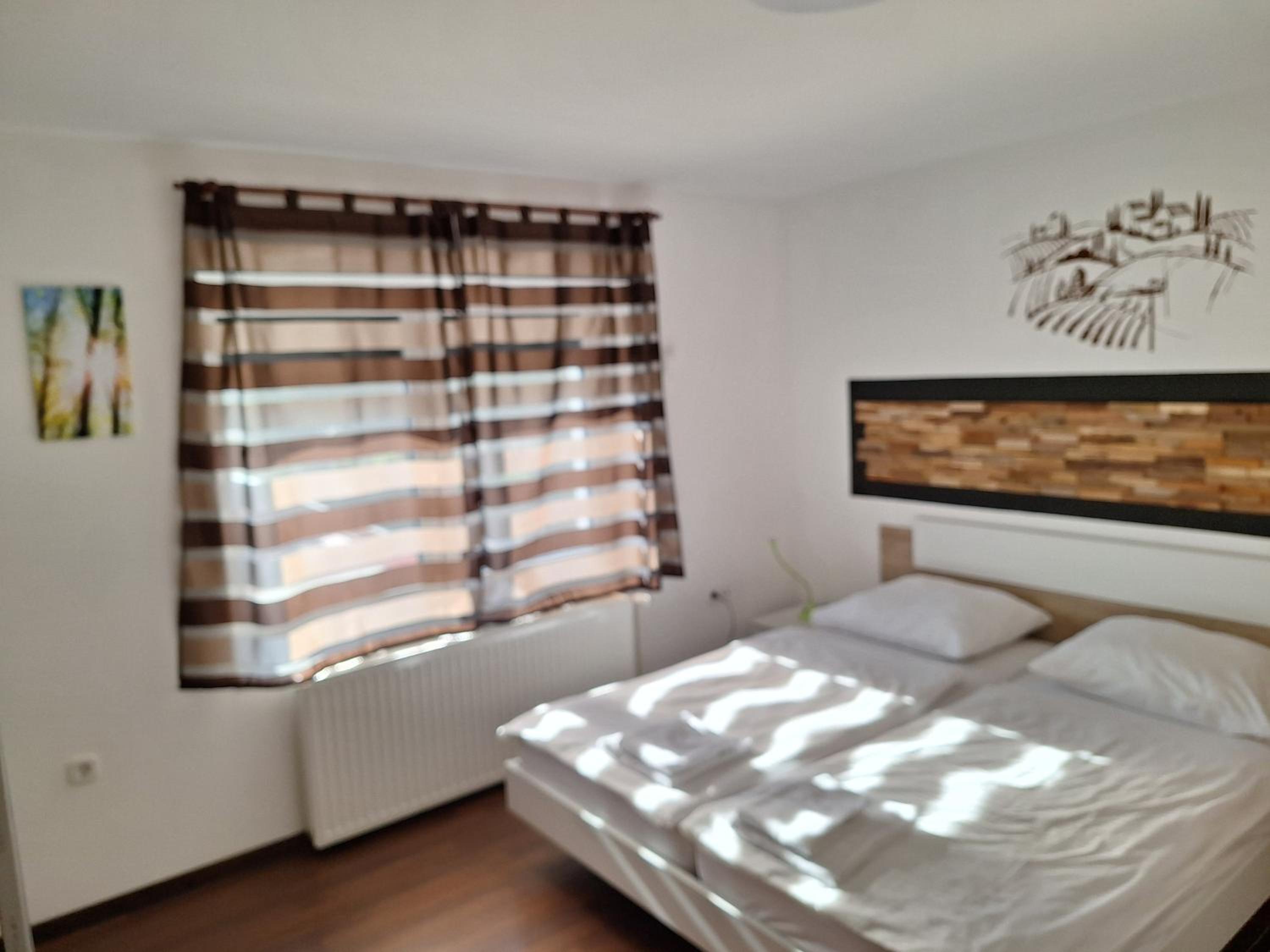 Three-Bedroom Apartment - Photo 10