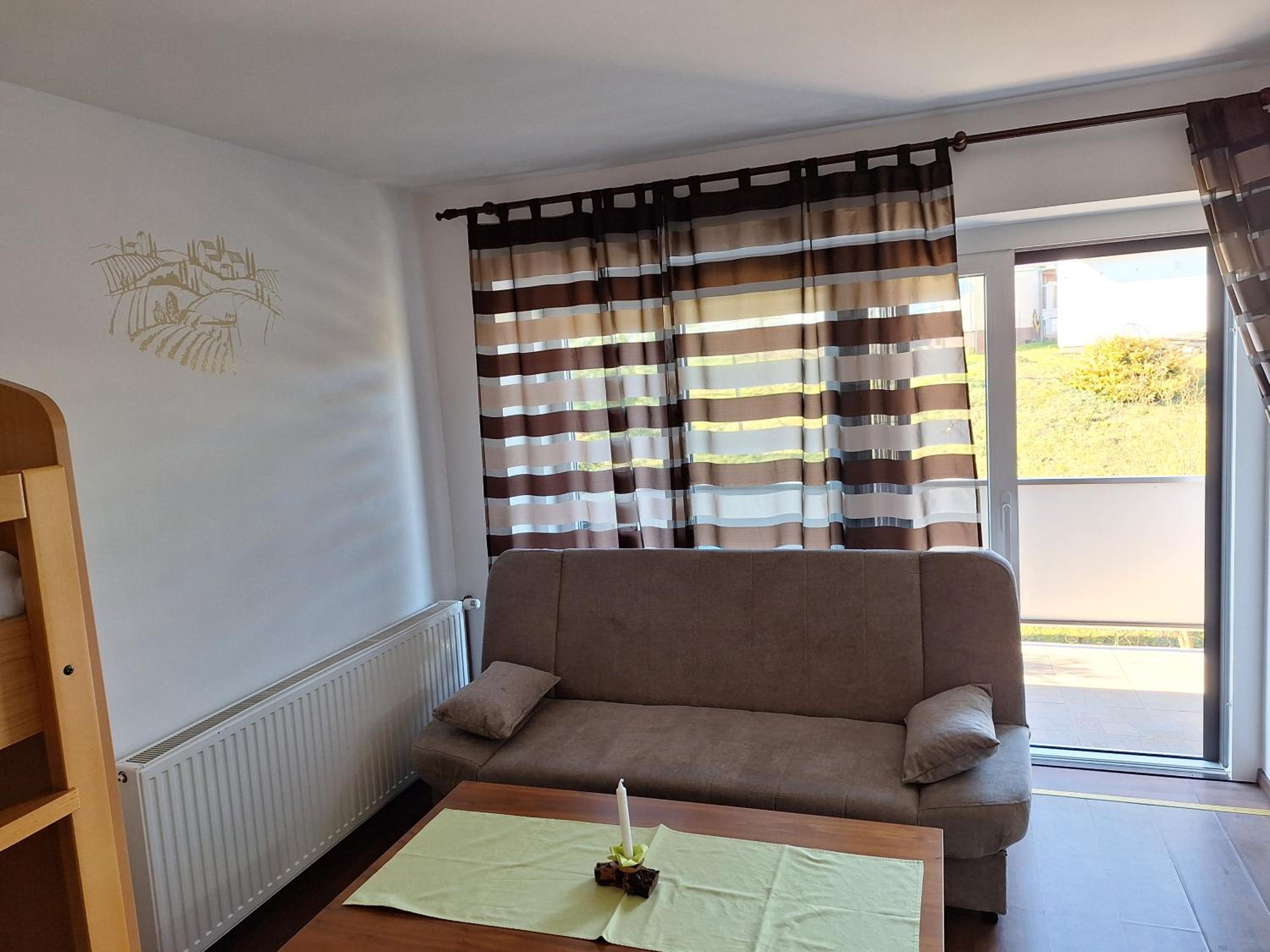 Three-Bedroom Apartment - Photo 8