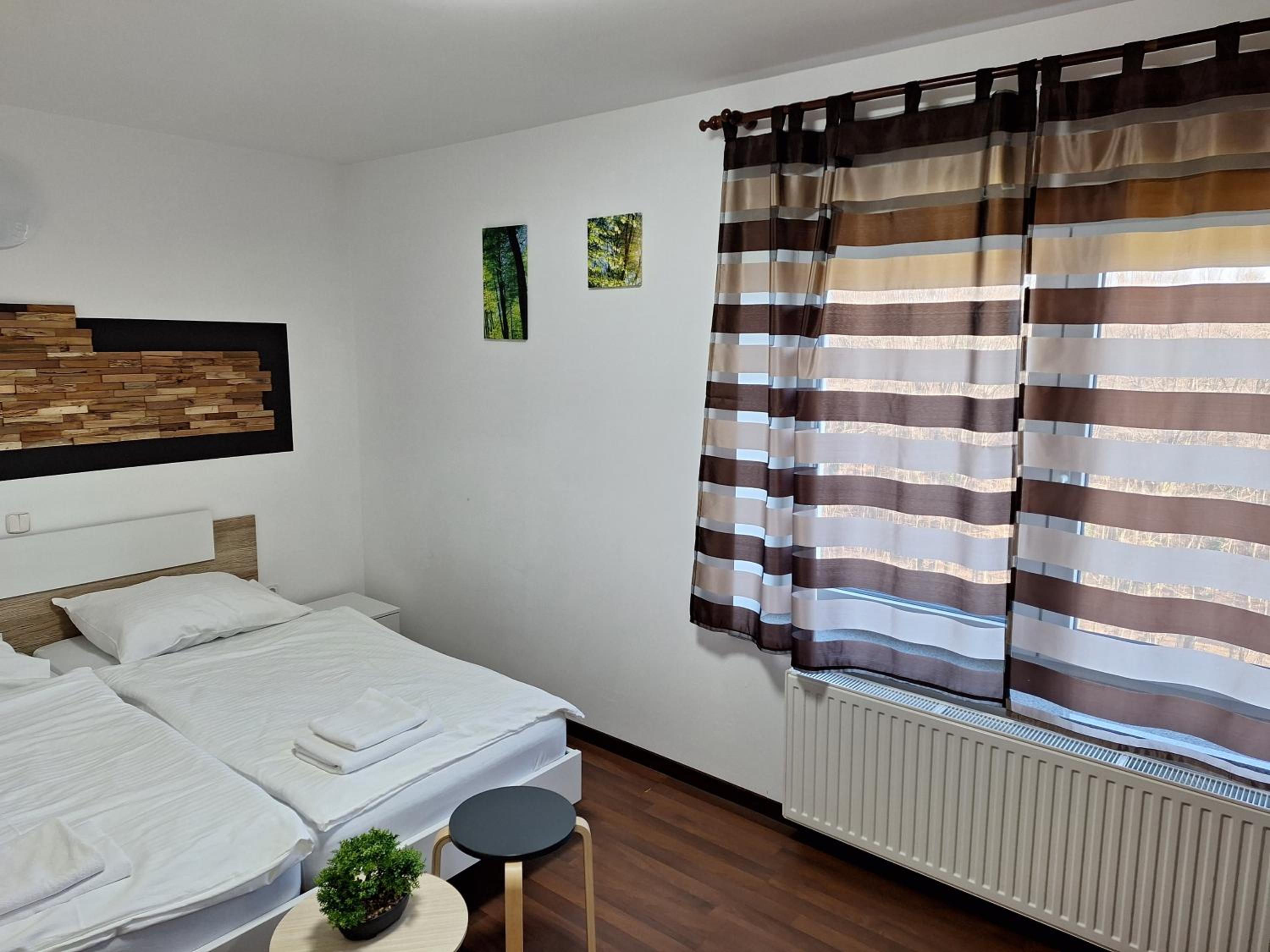 Three-Bedroom Apartment - Photo 3