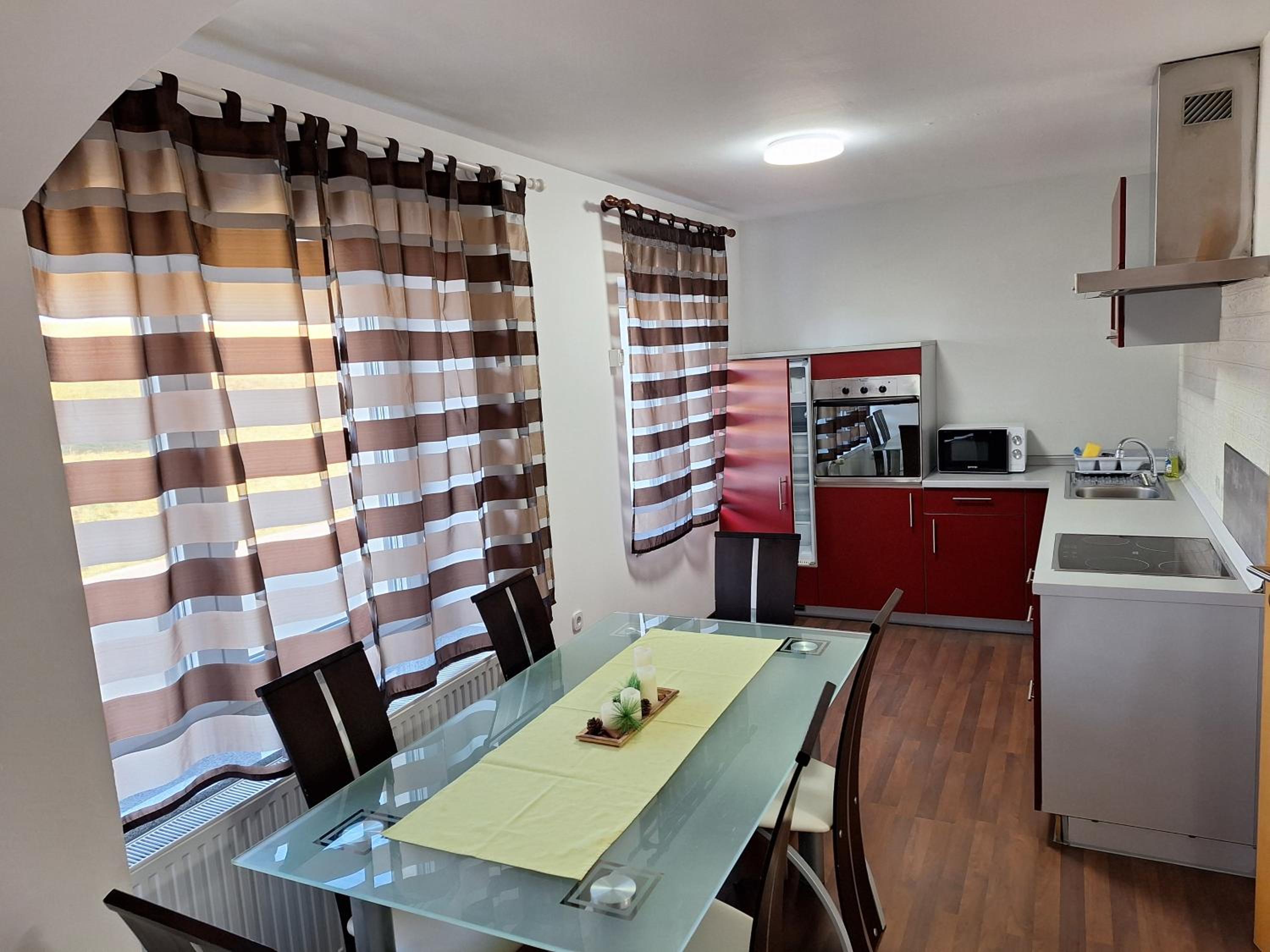 Three-Bedroom Apartment - Photo 11