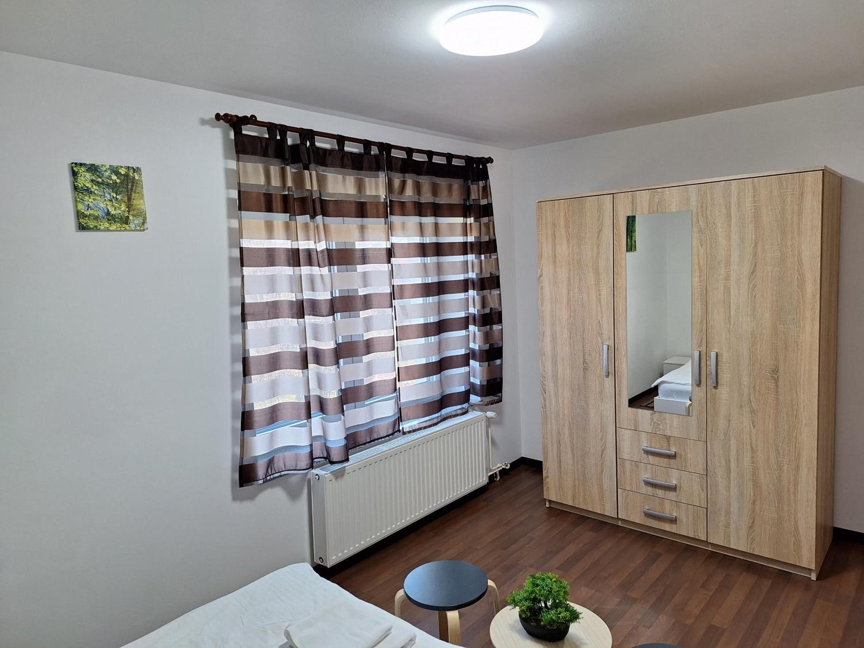 Three-Bedroom Apartment - Photo 13