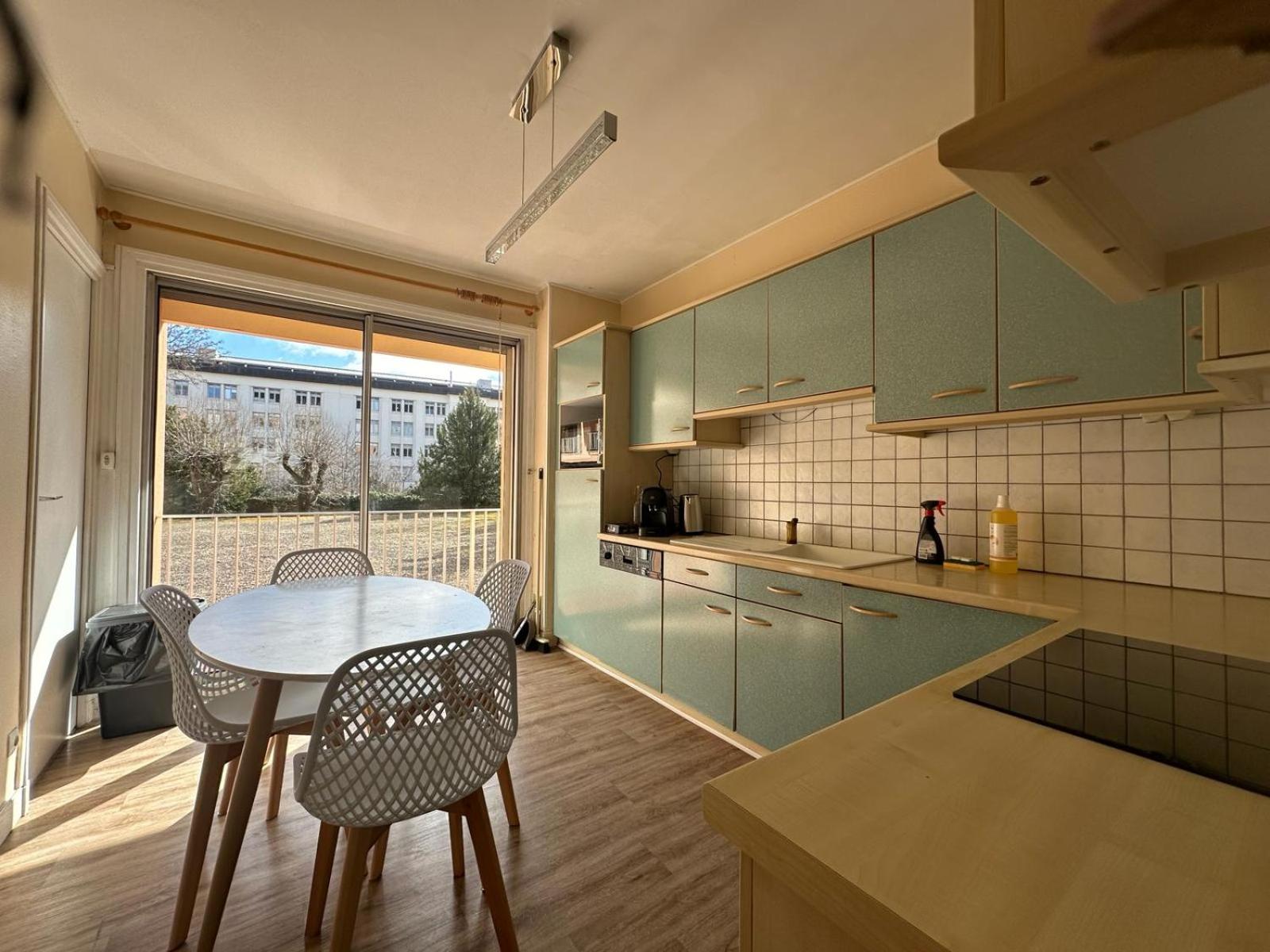 Three-Bedroom Apartment - Photo 2