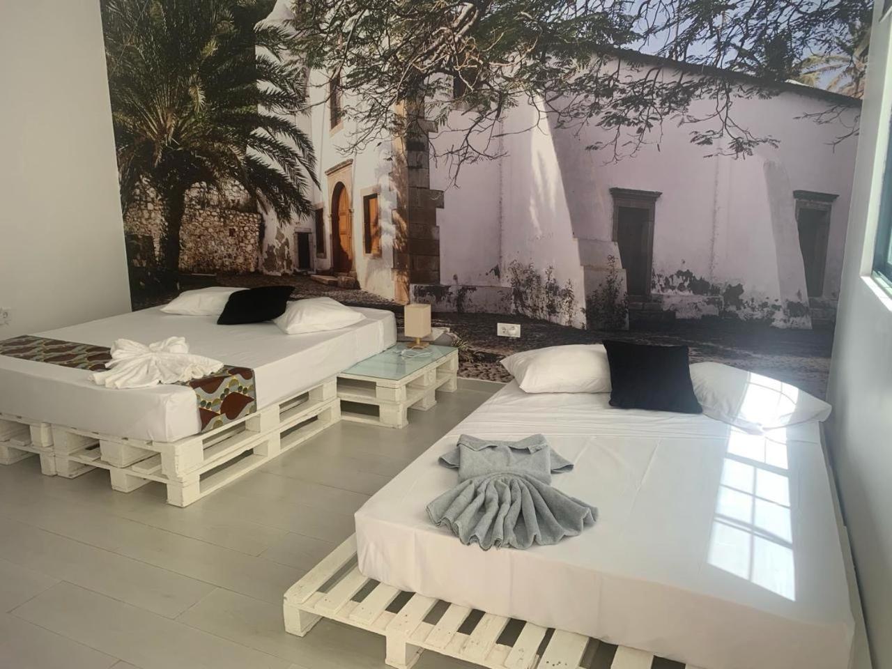 Quadruple Room with Private Bathroom