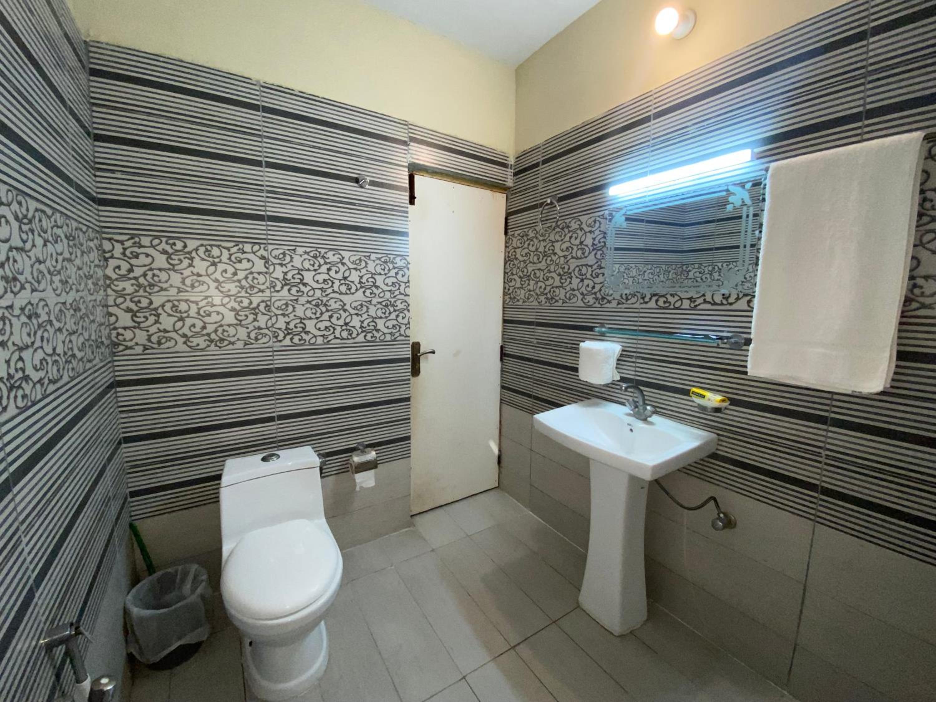 Deluxe Triple Room - Photo 12