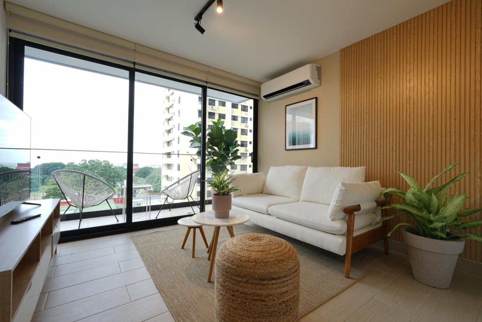 One-Bedroom Apartment with Balcony and City View