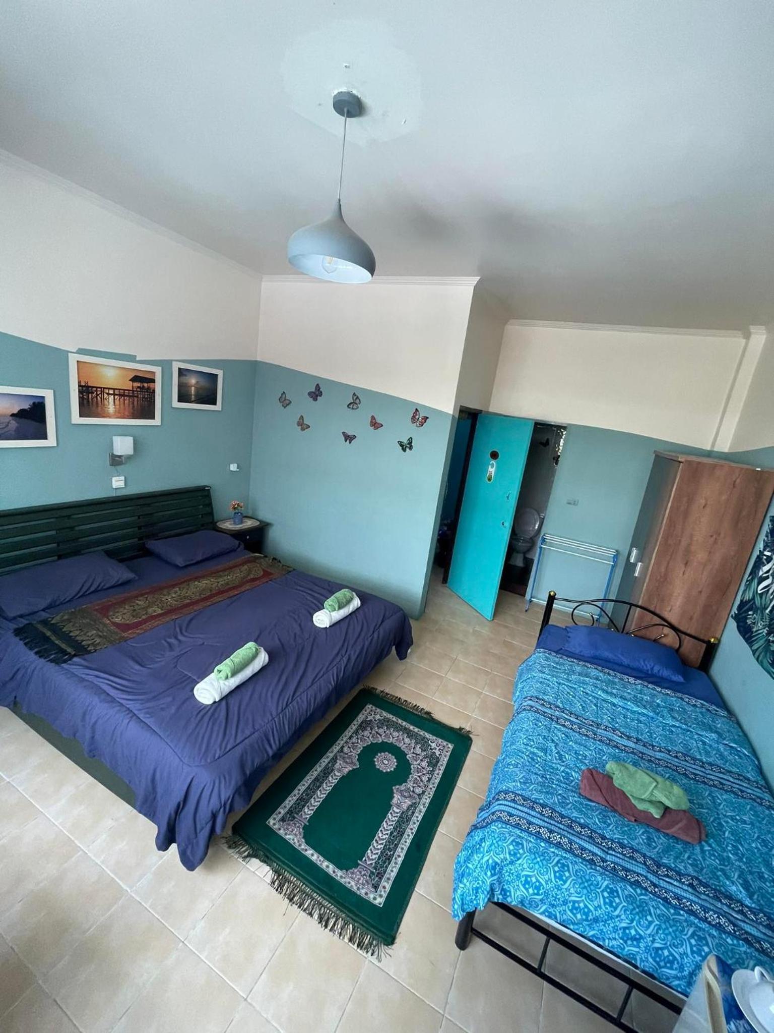 Standard Triple Room - Photo 9
