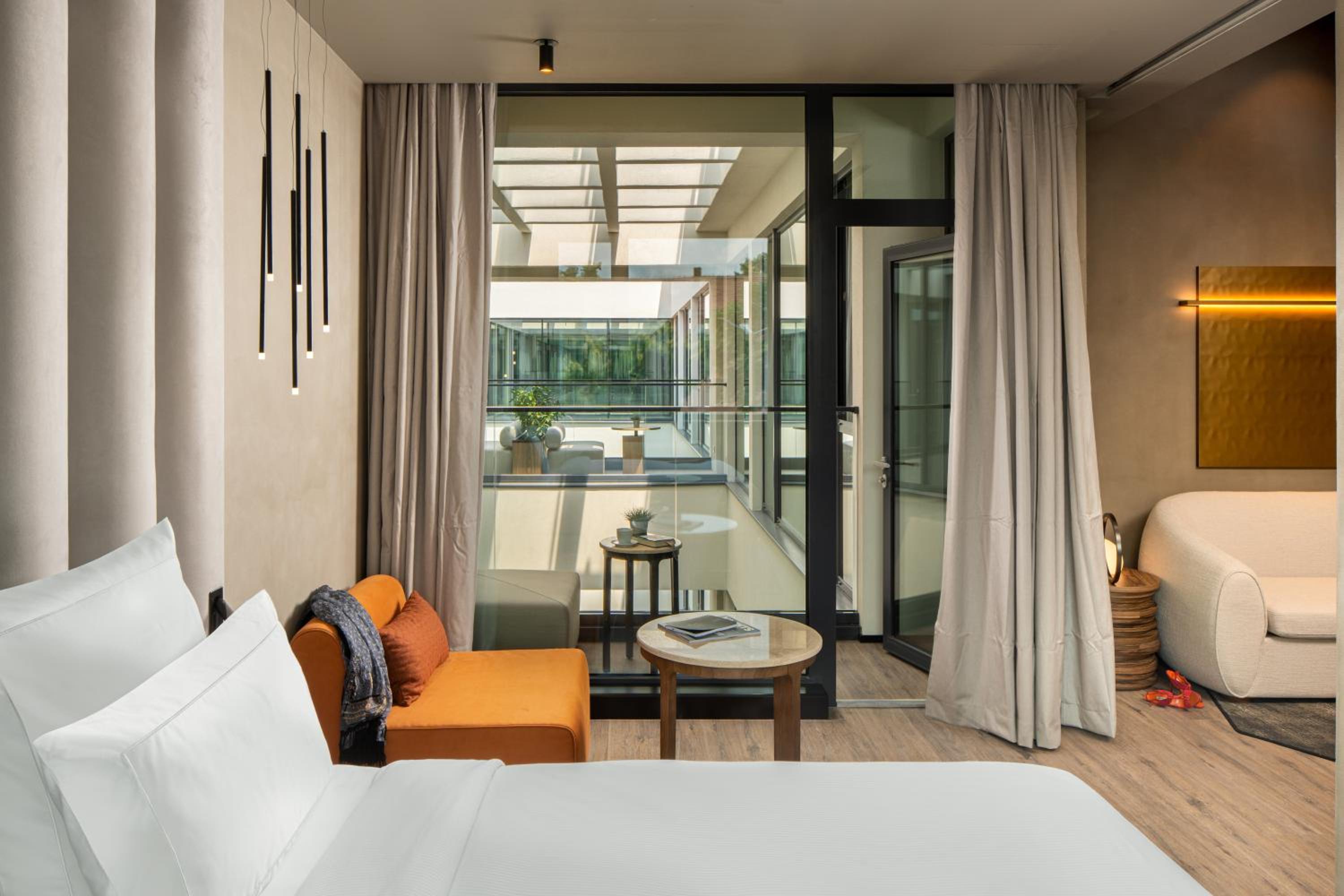 Deluxe Suite with One Double Bed and Balcony - Photo 1