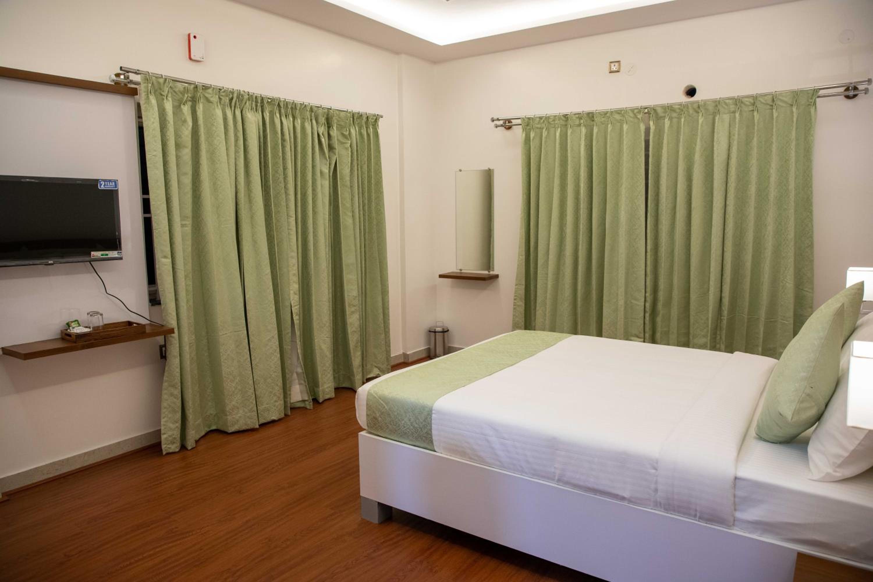 Deluxe Room - Photo 1