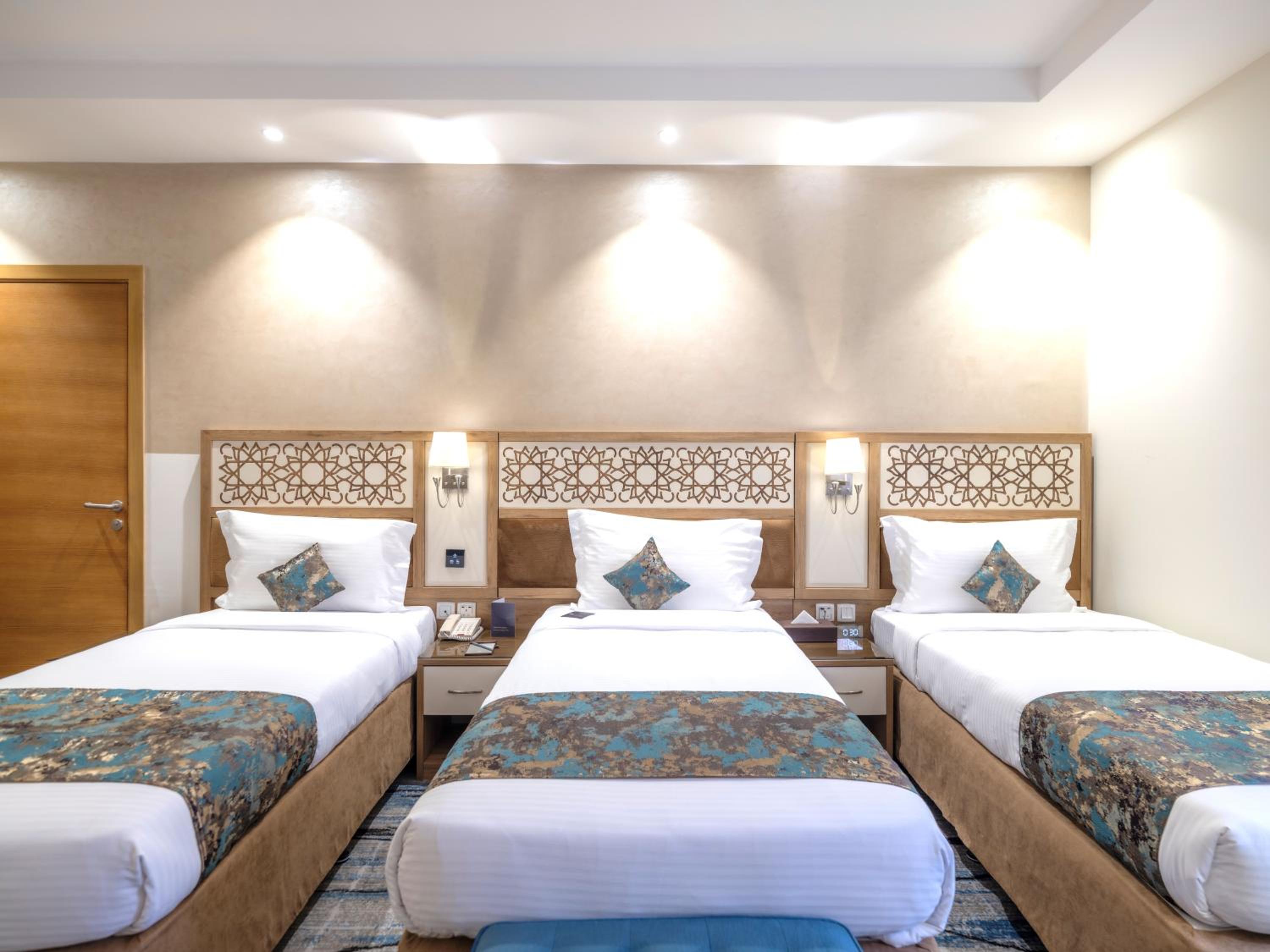Deluxe Triple Room - Photo 7
