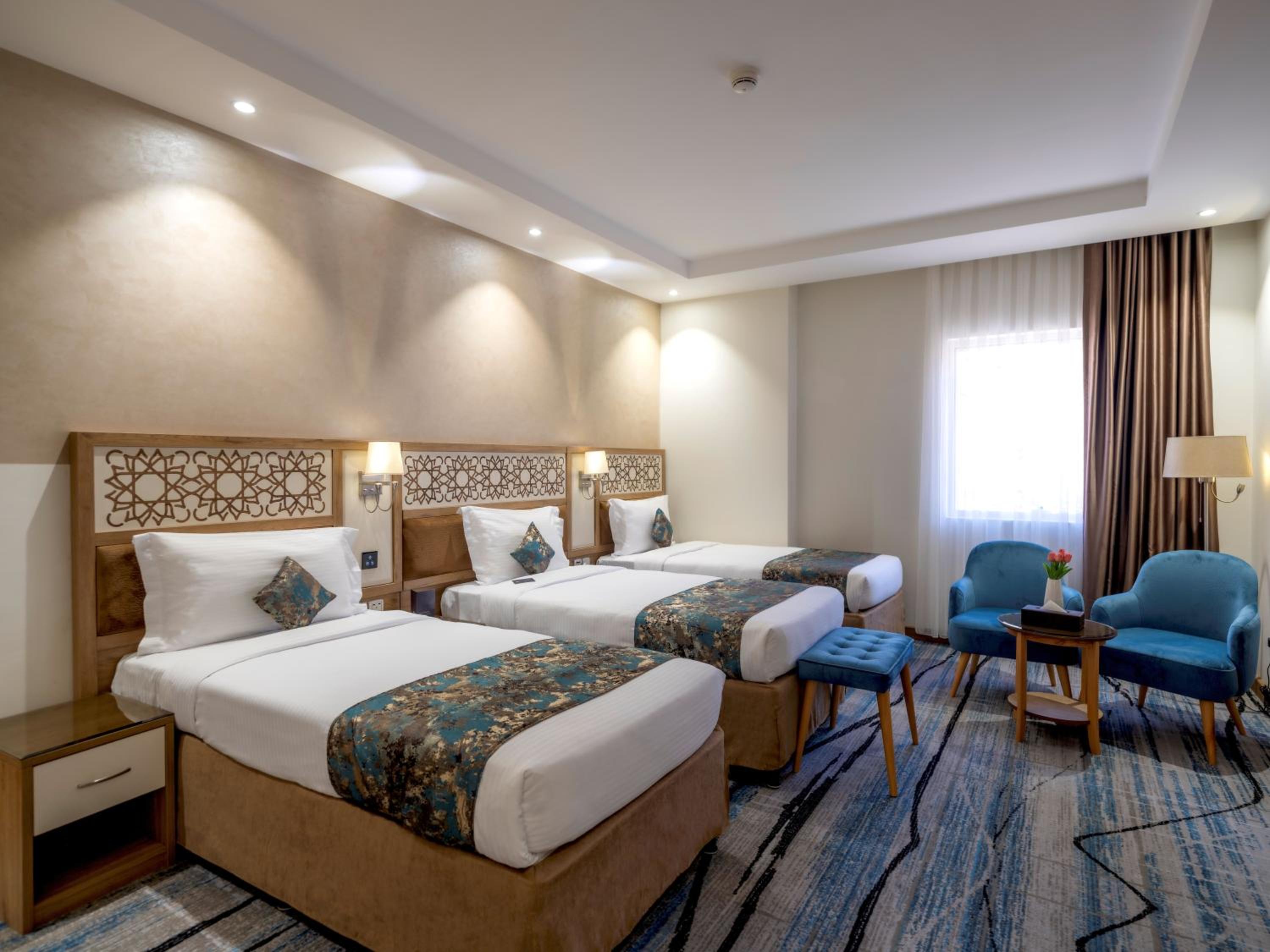 Deluxe Triple Room - Photo 8