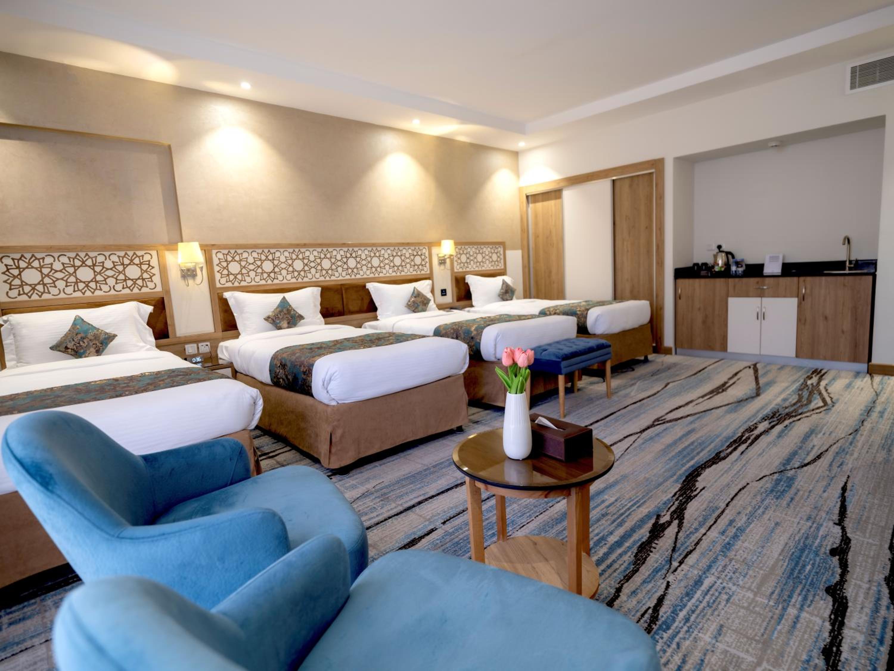 Deluxe Quadruple Room - Photo 8