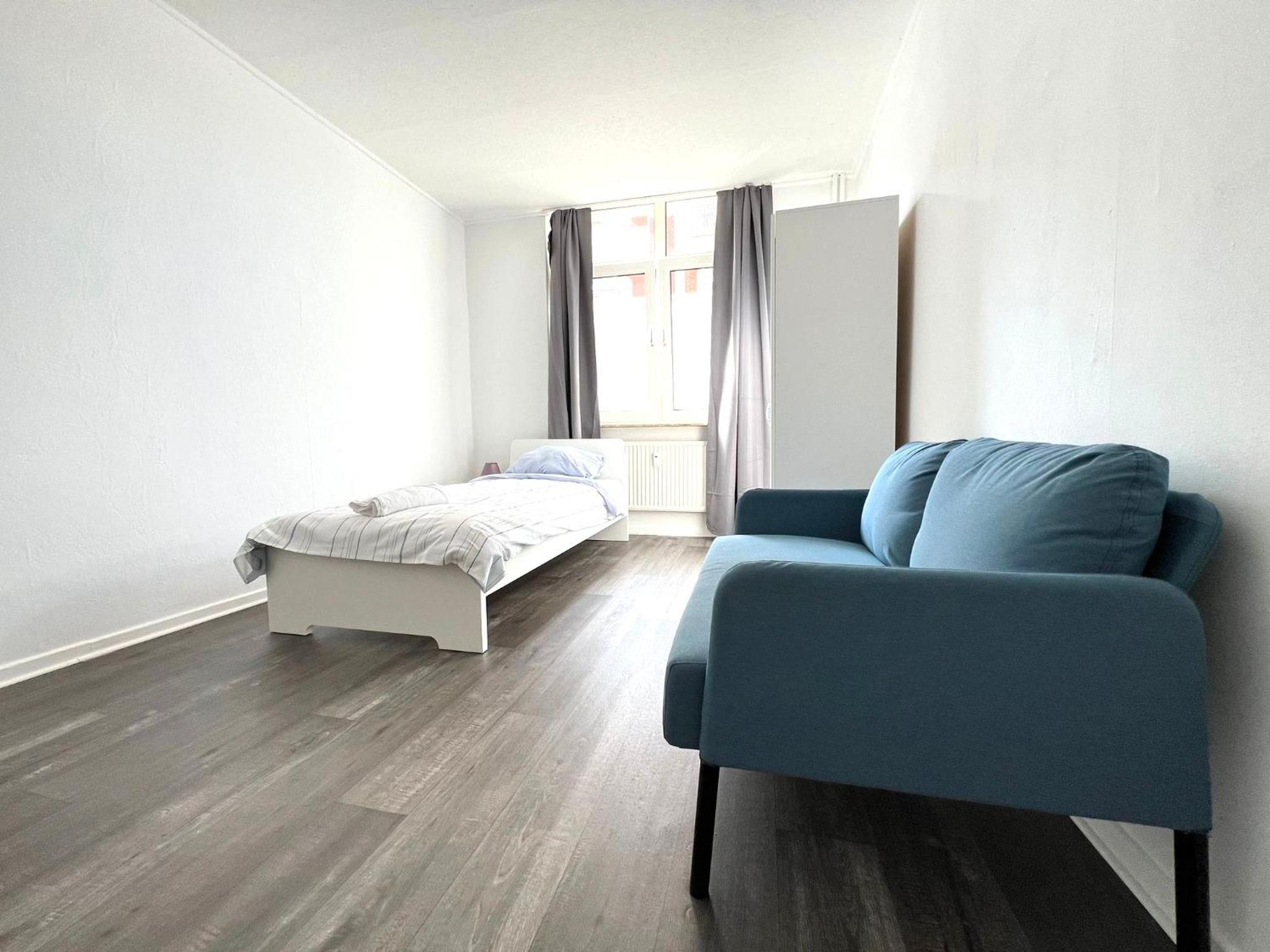 Three-Bedroom Apartment photo 1