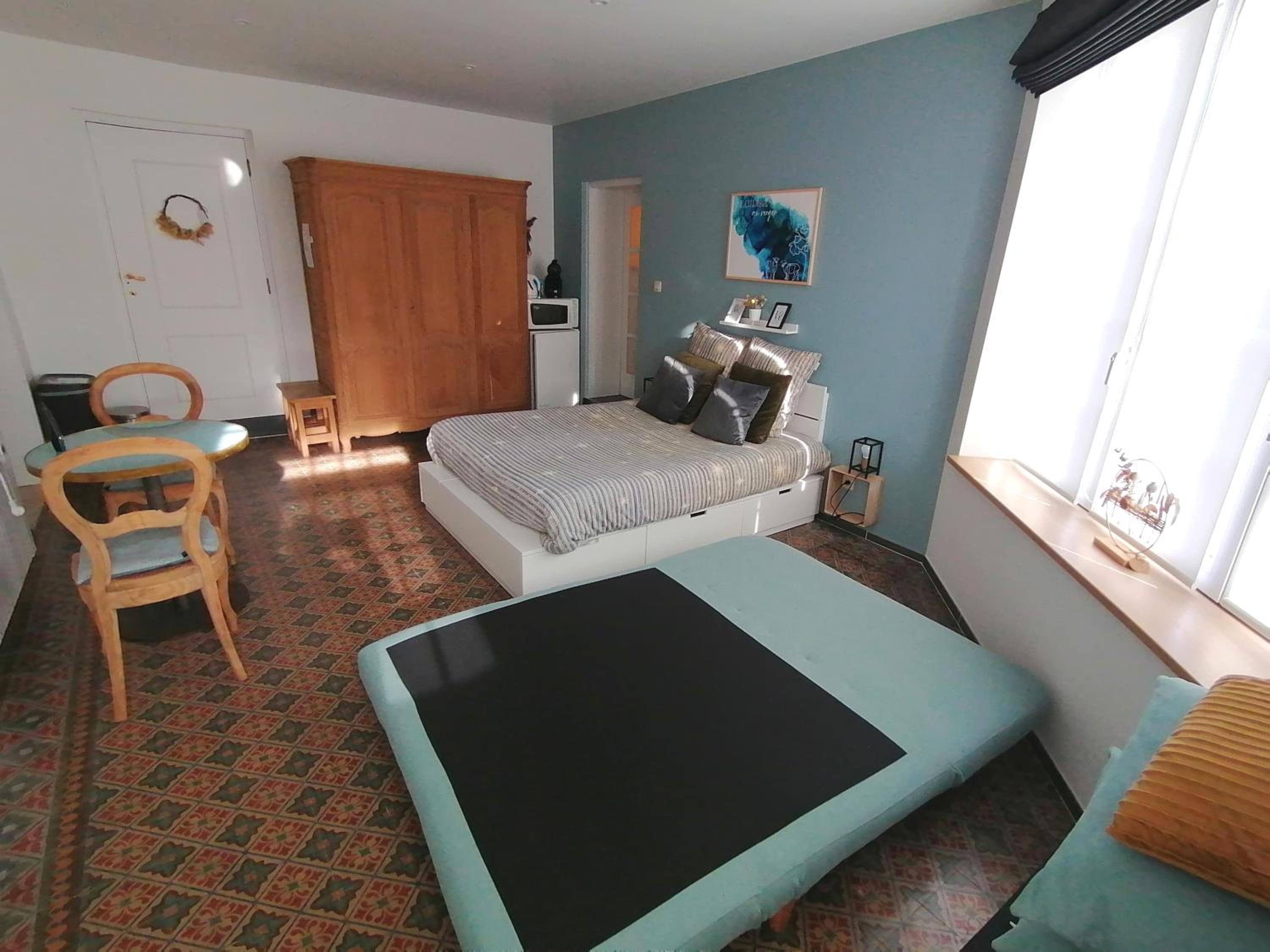 Quadruple Room with Private Bathroom photo 3