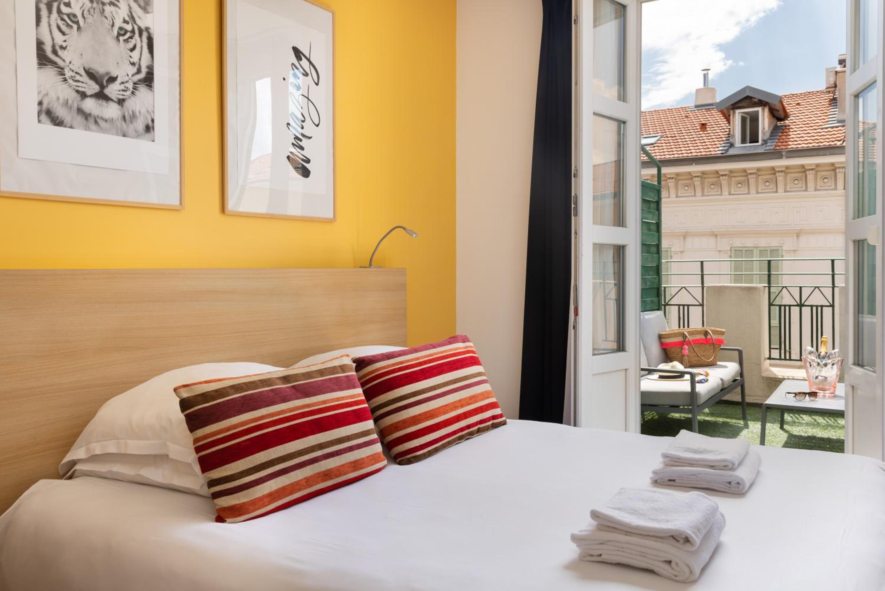 Relax in style with vibrant decor and a cozy ambiance.