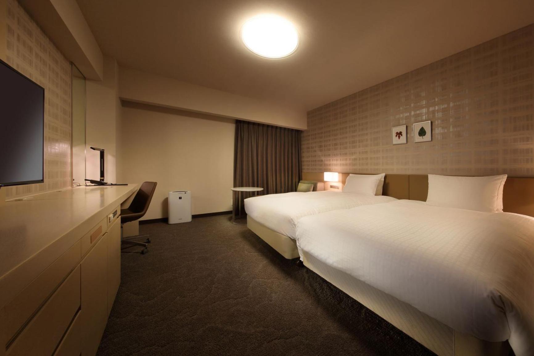 Twin Room - Non-Smoking - Photo 6