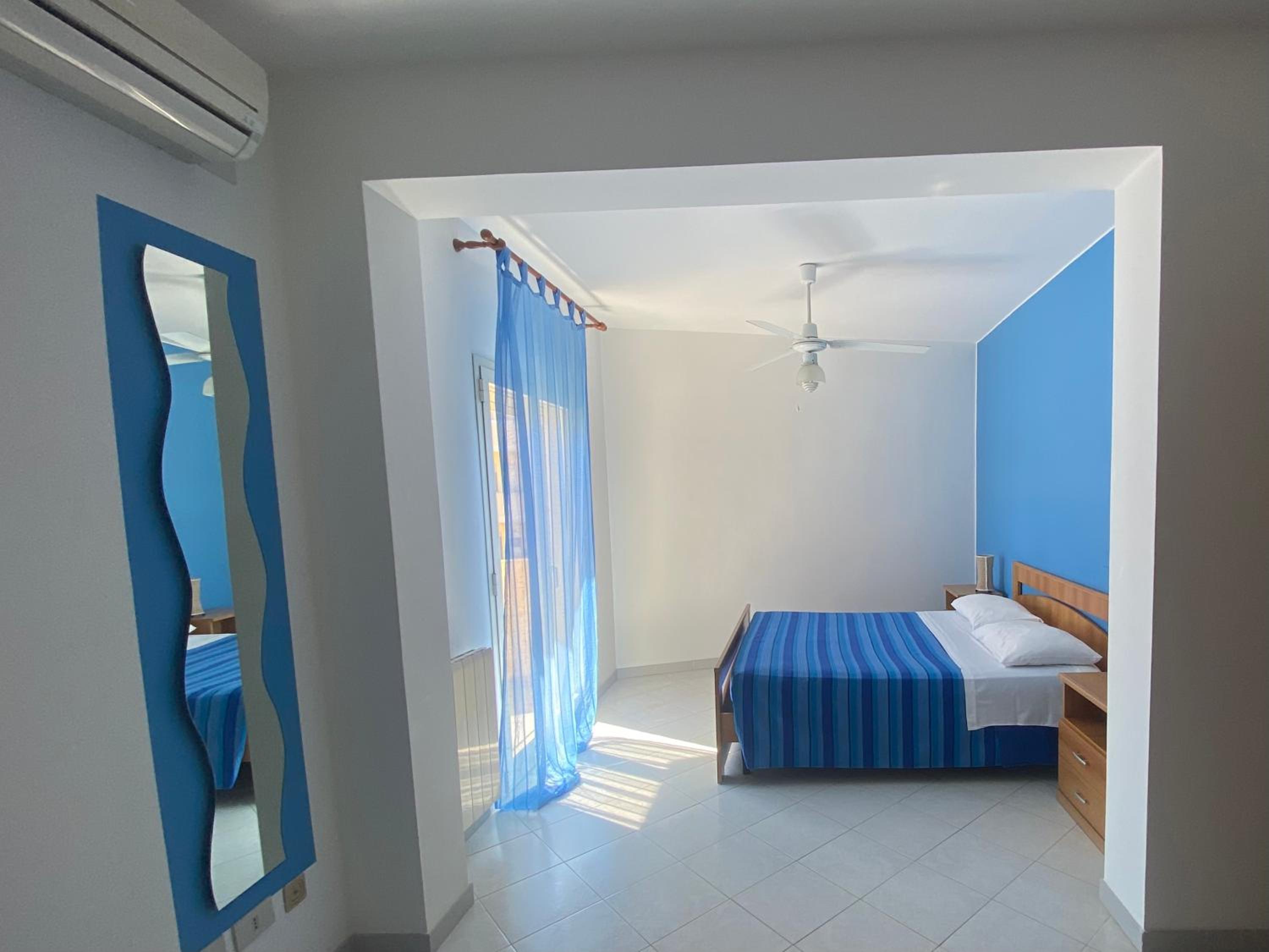 One-Bedroom Apartment with Balcony and City View