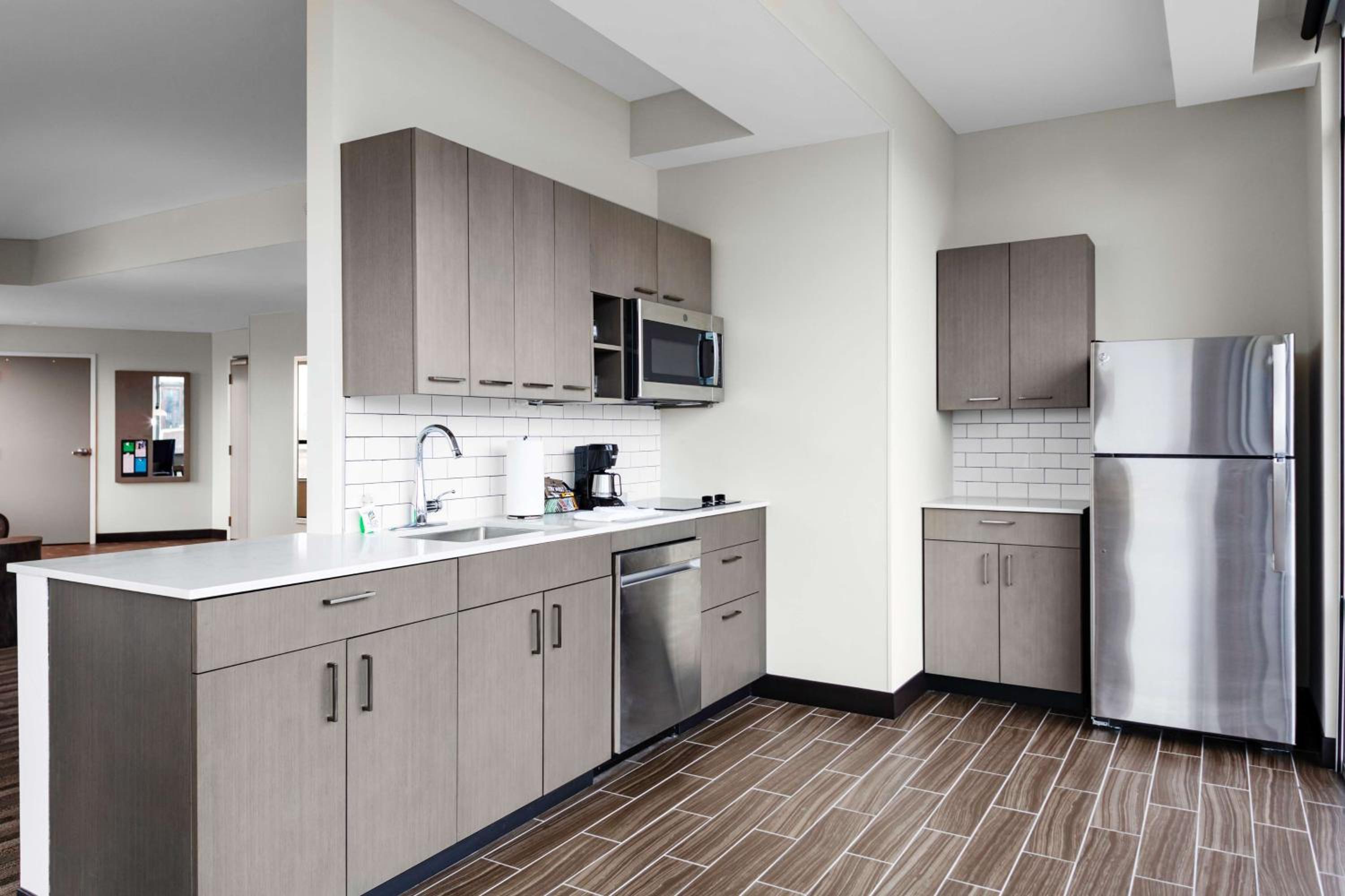 One-Bedroom Specialty King Suite with Kitchen and Sofa Bed - Disability Access - Photo 3