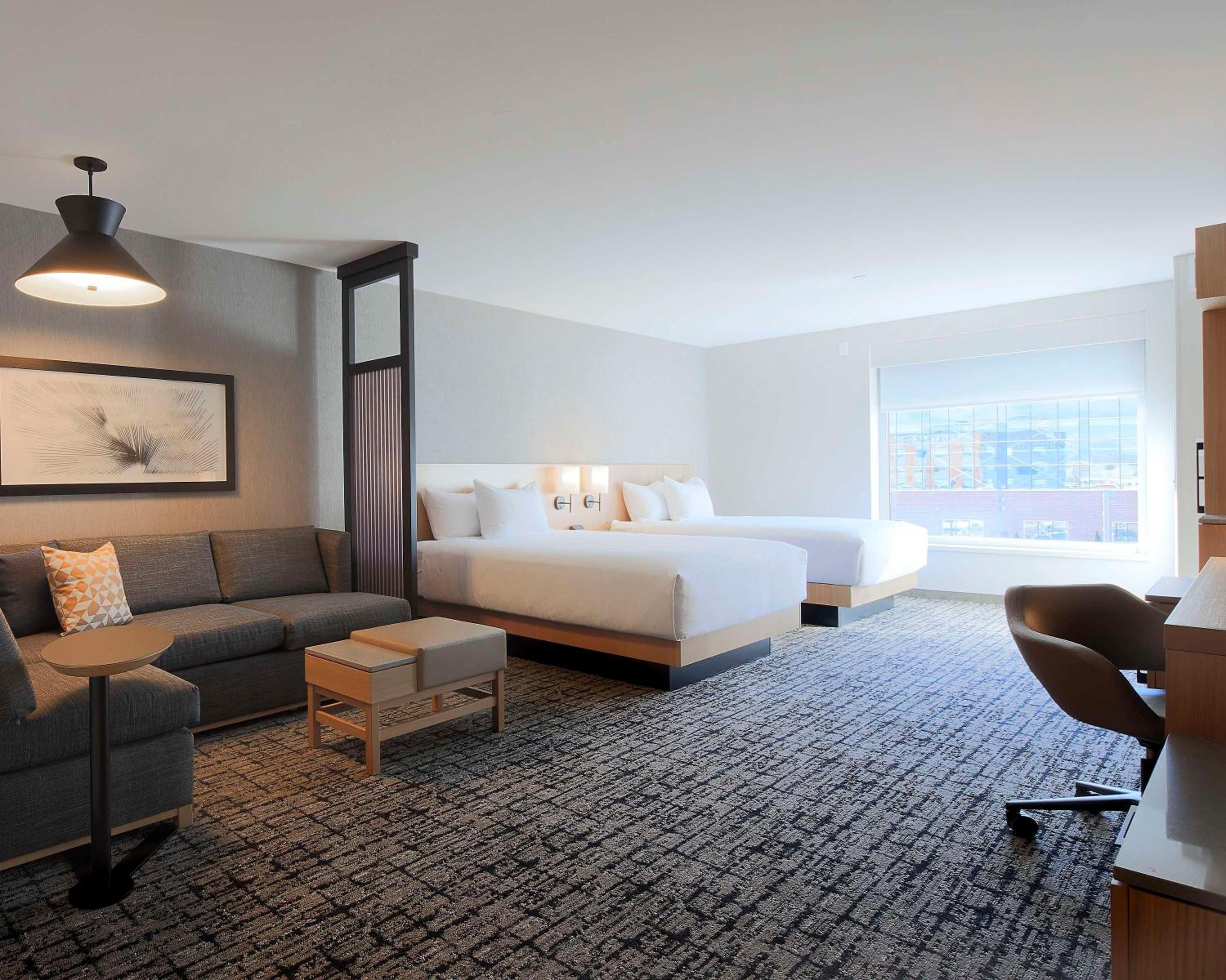 Queen Room with Two Queen Beds, Sofa Bed and Accessible Tub - Photo 1