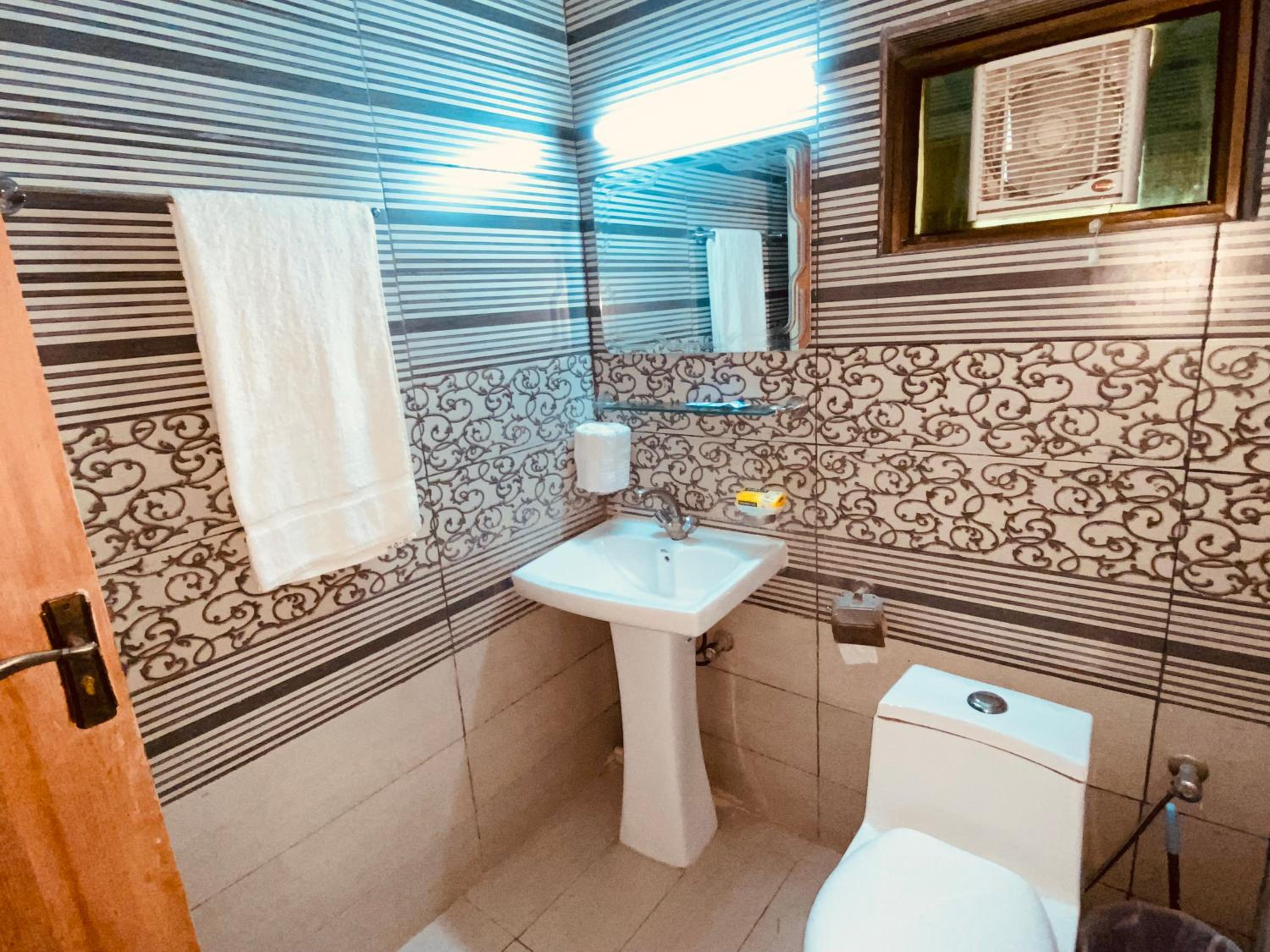 Deluxe Triple Room - Photo 16