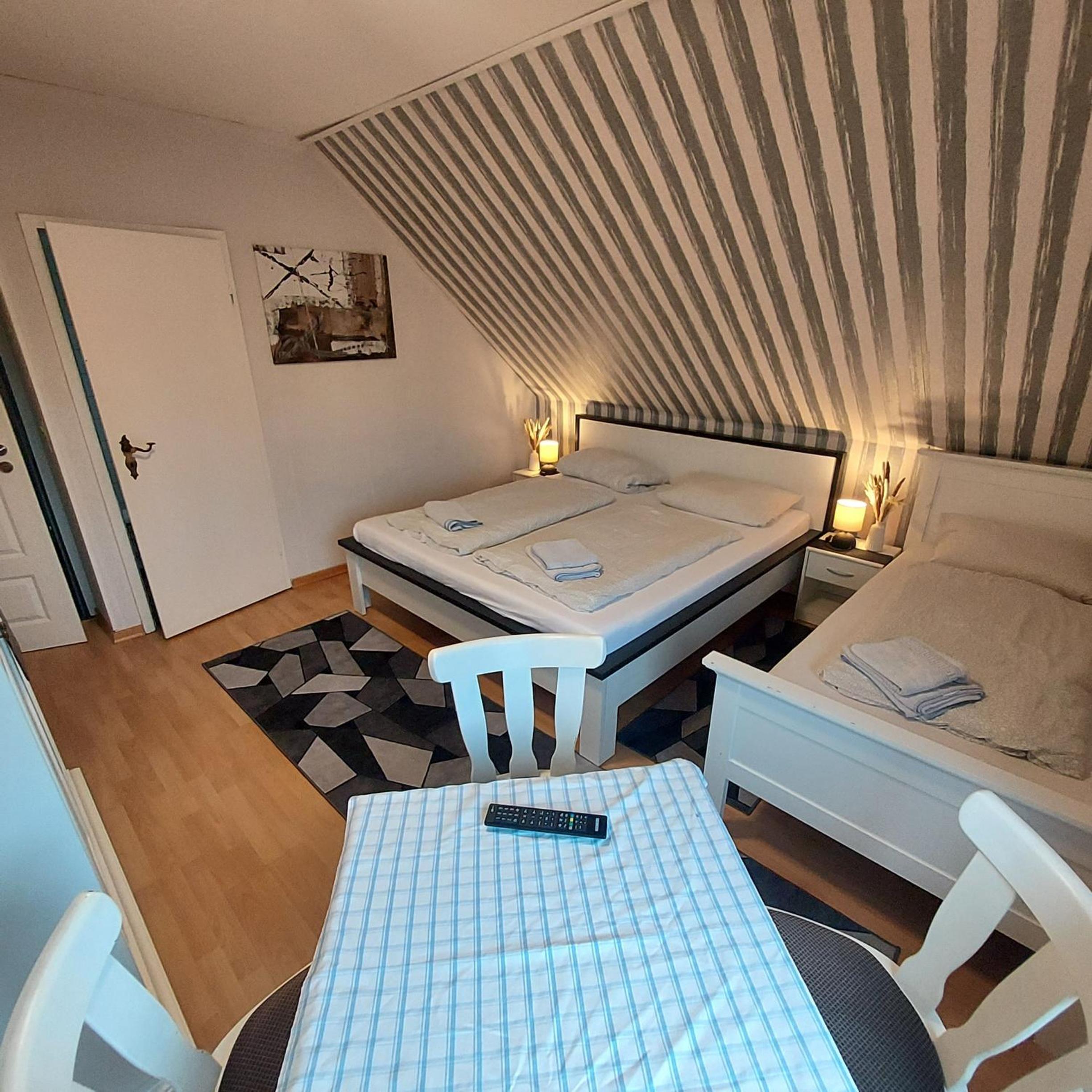 Triple Room with Doublebed - Photo 1