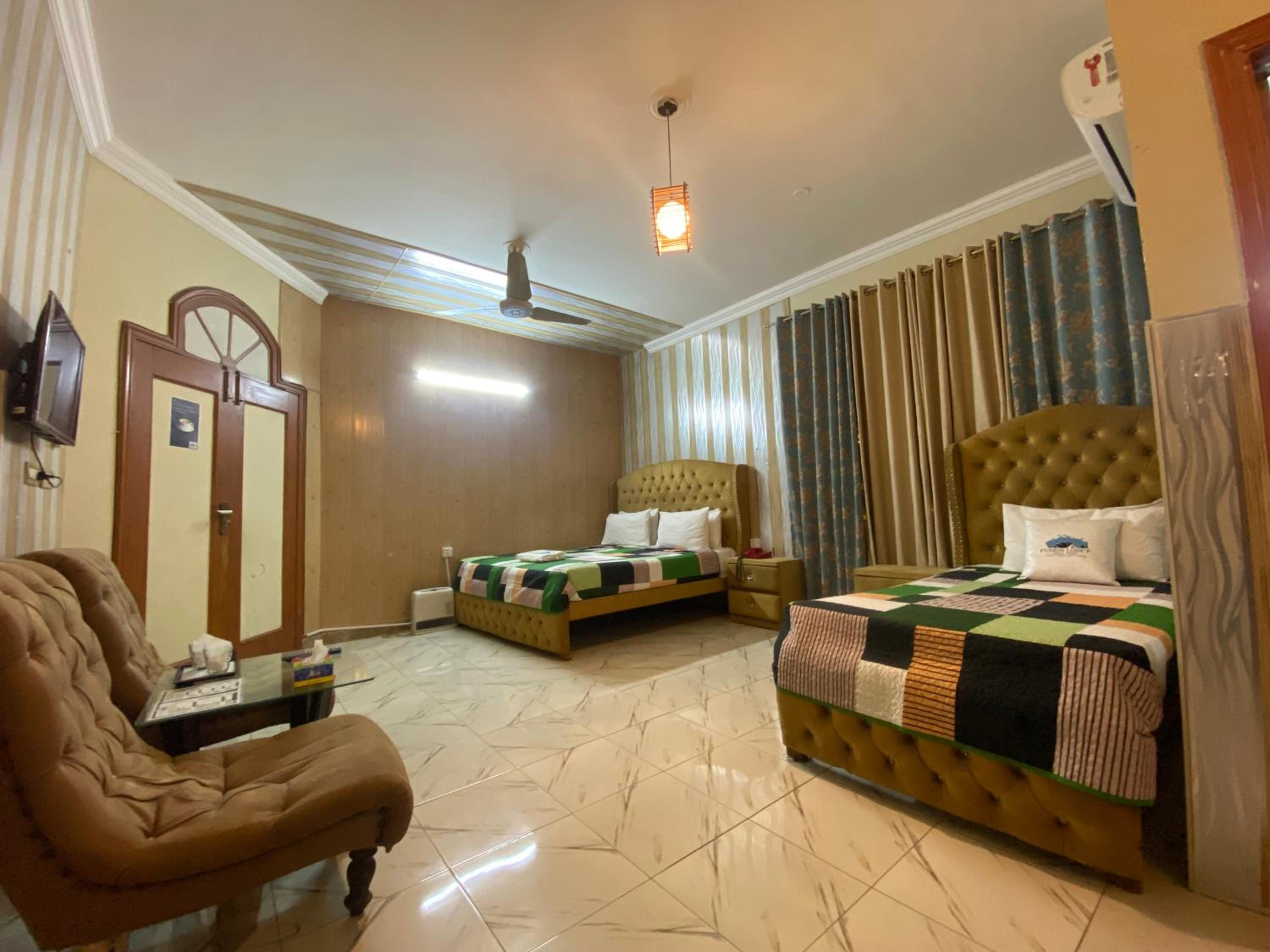 Deluxe Triple Room - Photo 17
