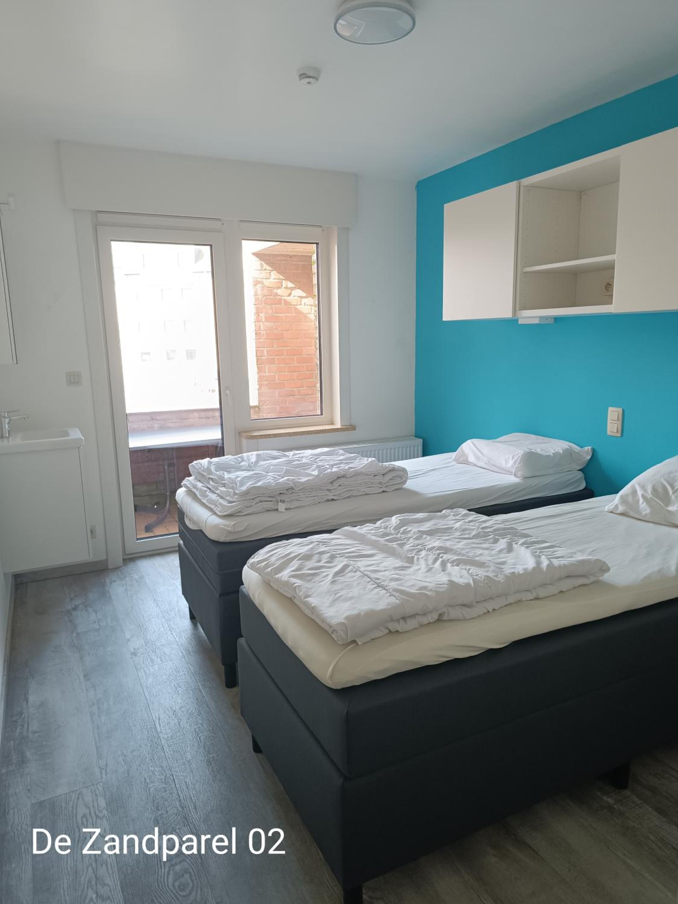 Three-Bedroom Apartment - Photo 6