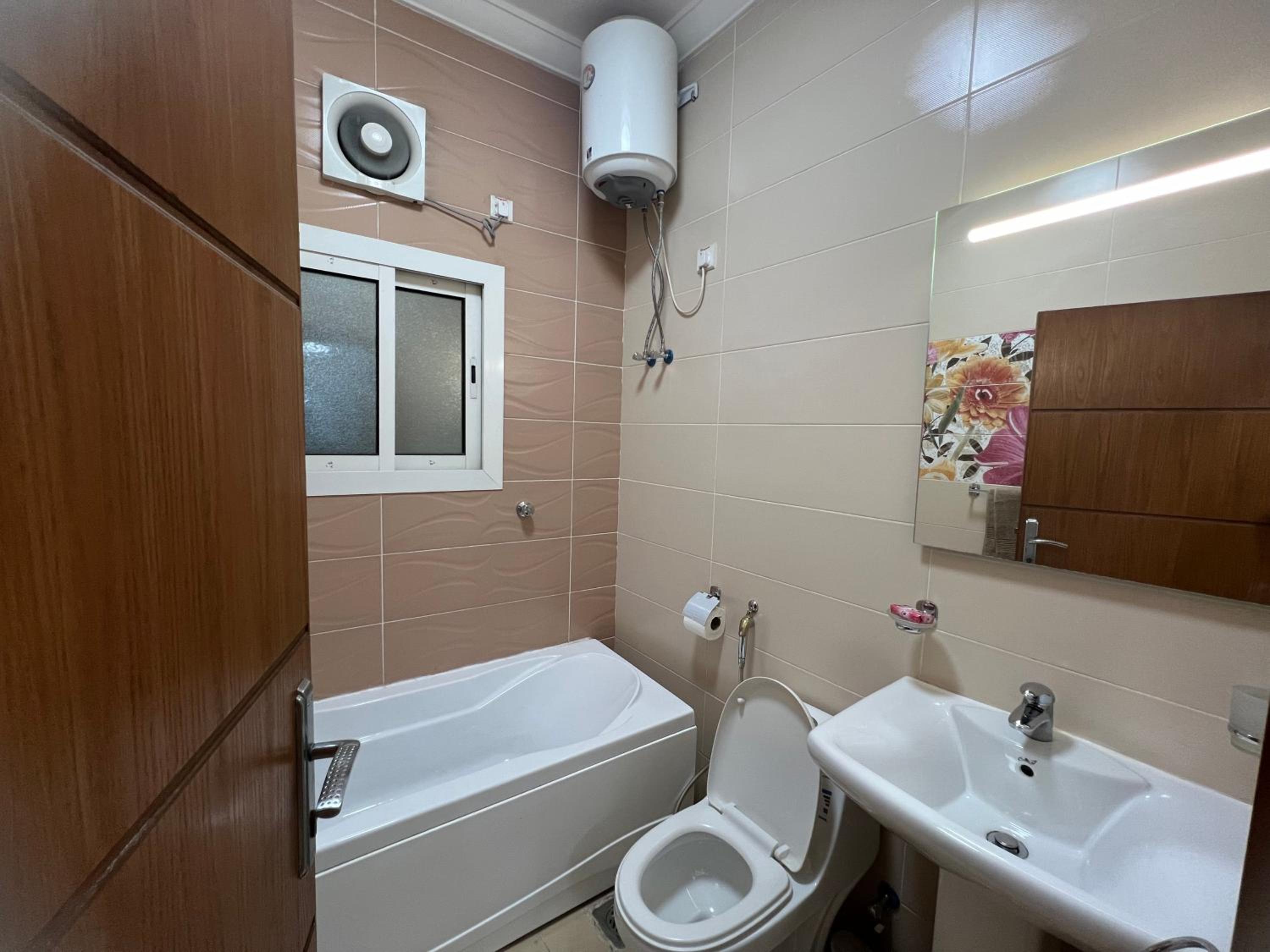 Three-Bedroom Apartment photo 1