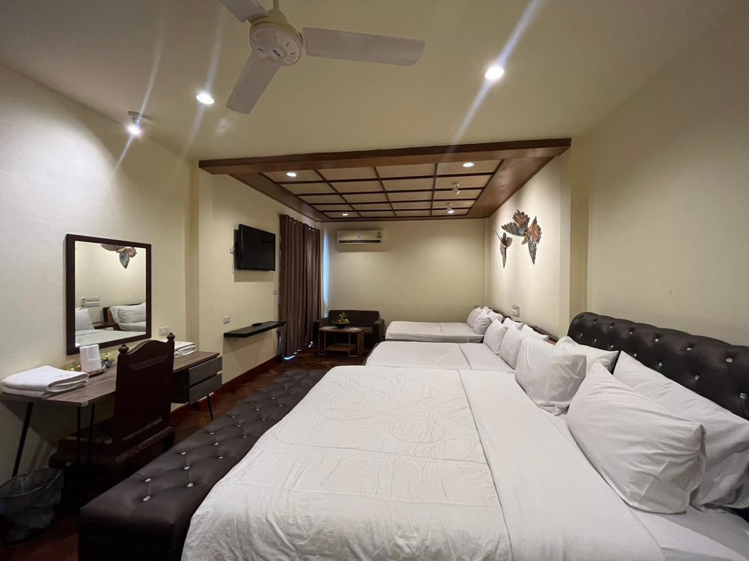 Grand Triple Room - Photo 2