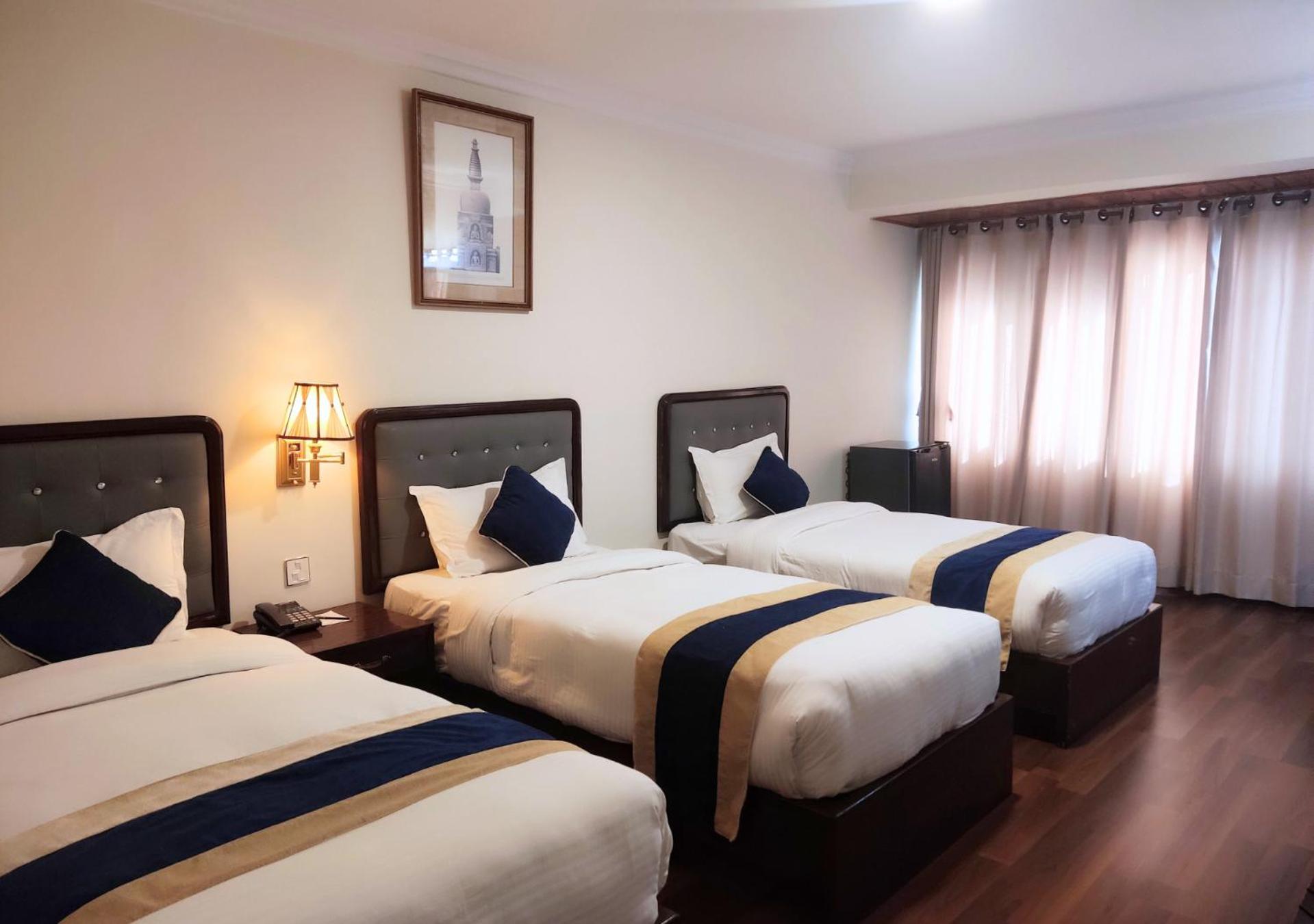 Deluxe Triple Room - Photo 2