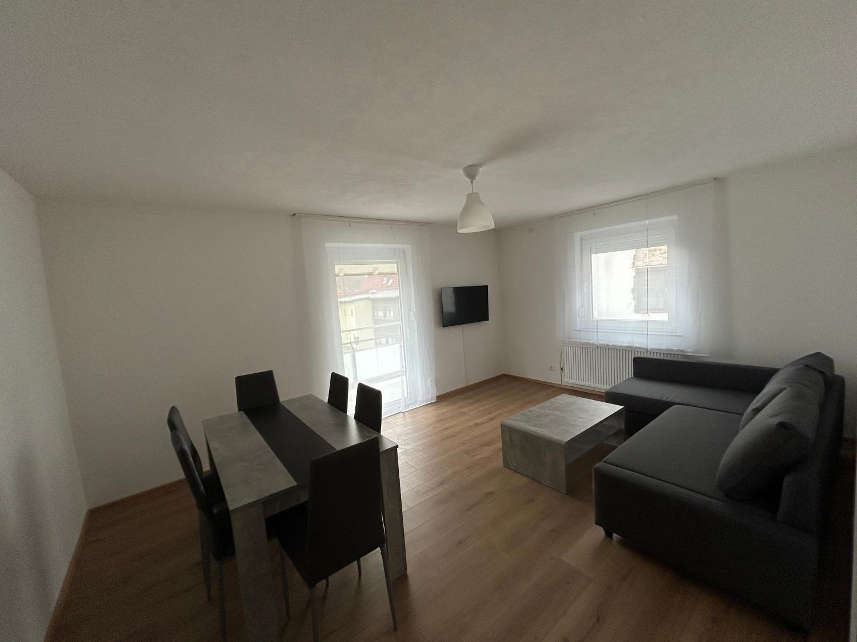 Three-Bedroom Apartment with Balcony photo 1