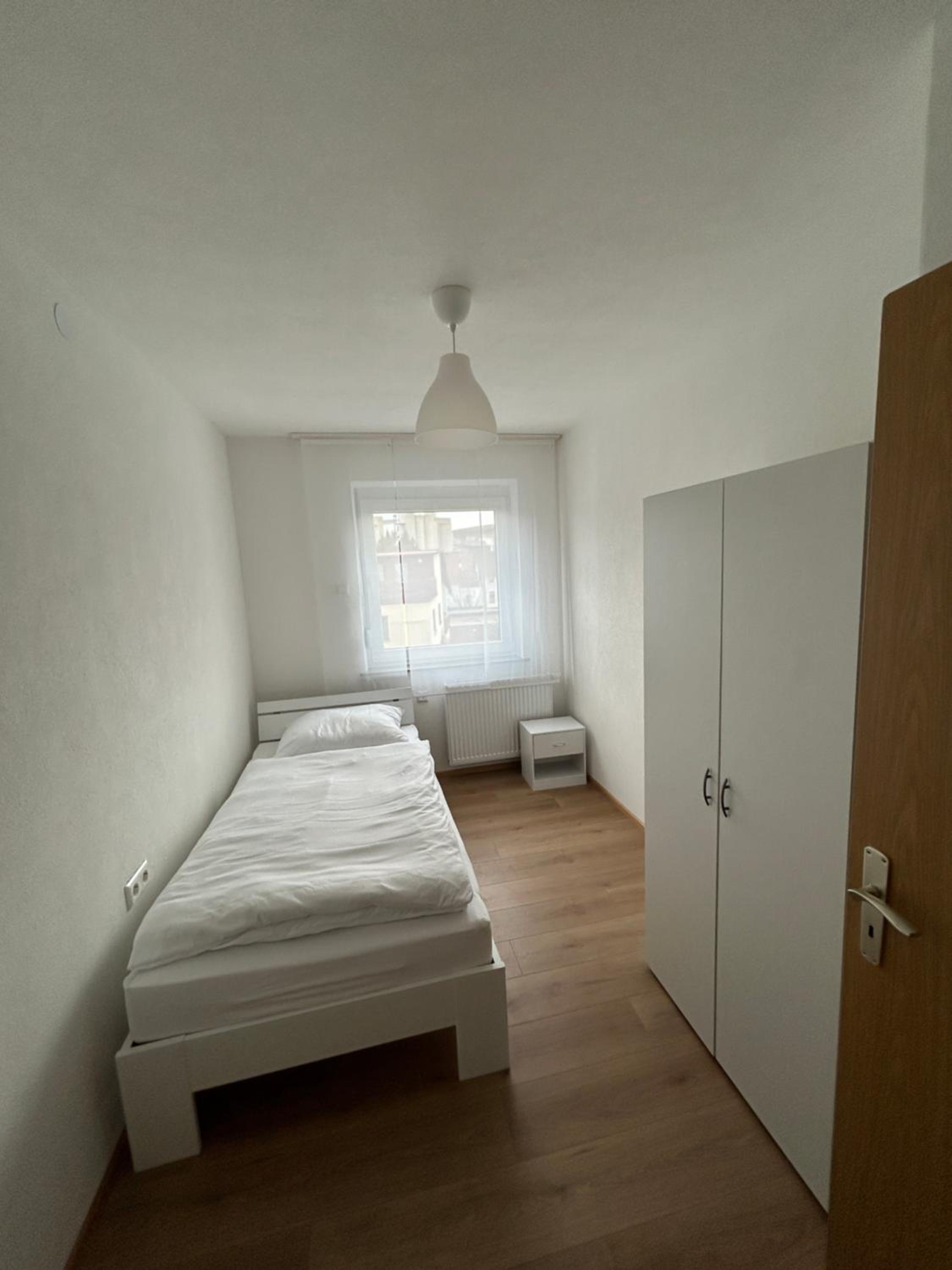 Three-Bedroom Apartment with Balcony photo 3