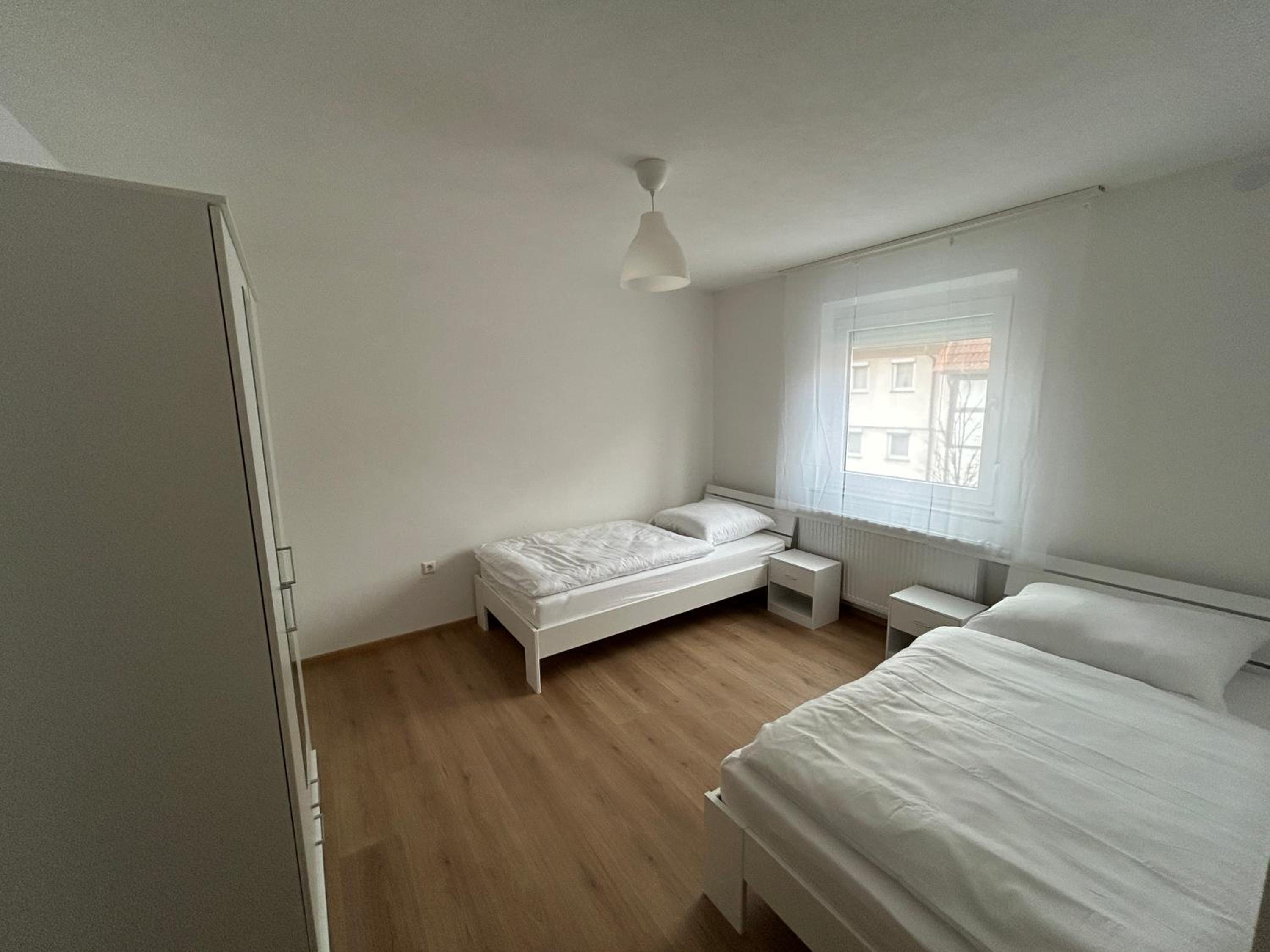 Three-Bedroom Apartment with Balcony photo 2