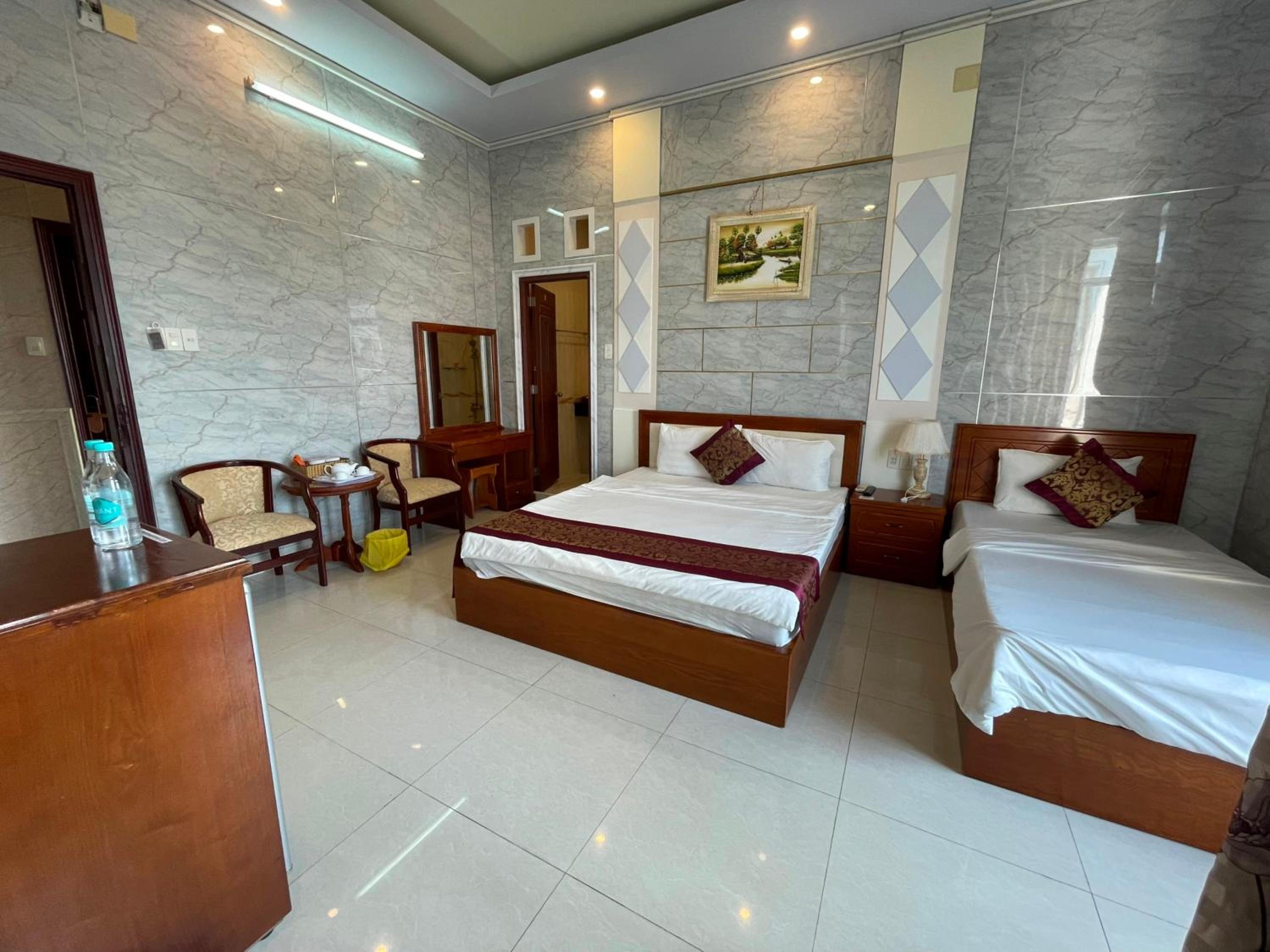 Deluxe Triple Room - Photo 1
