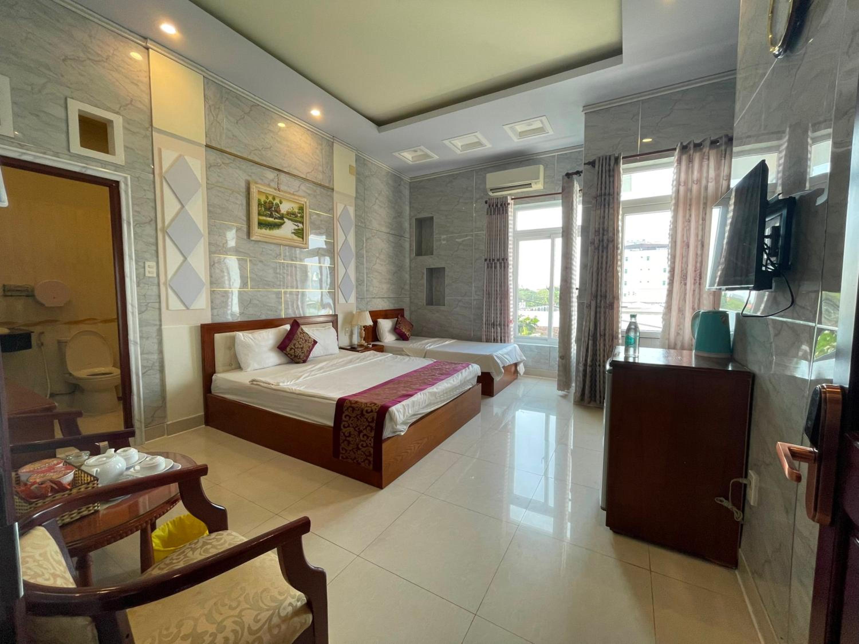 Deluxe Triple Room - Photo 2
