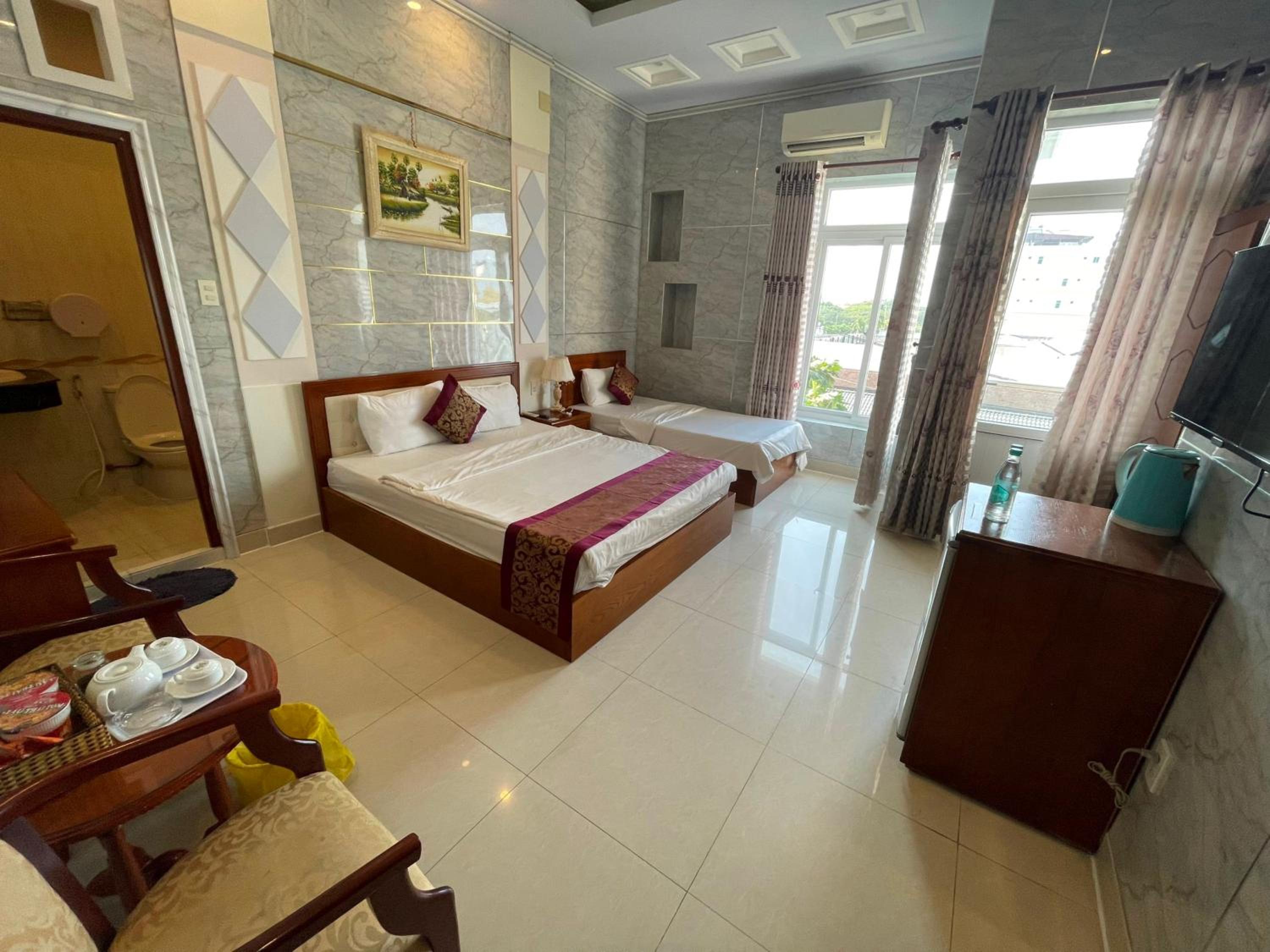 Deluxe Triple Room - Photo 4