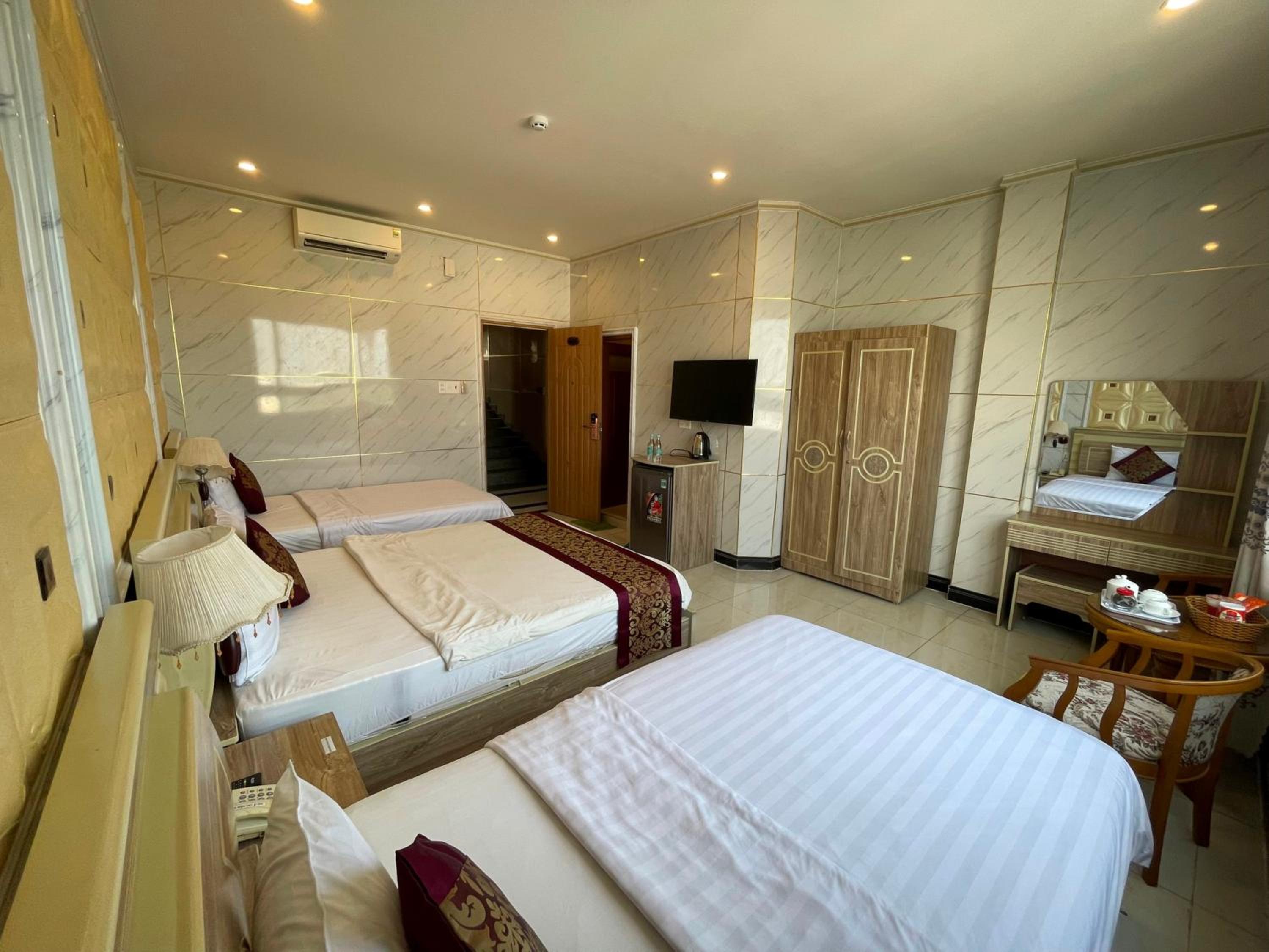 Deluxe Quadruple Room - Photo 7