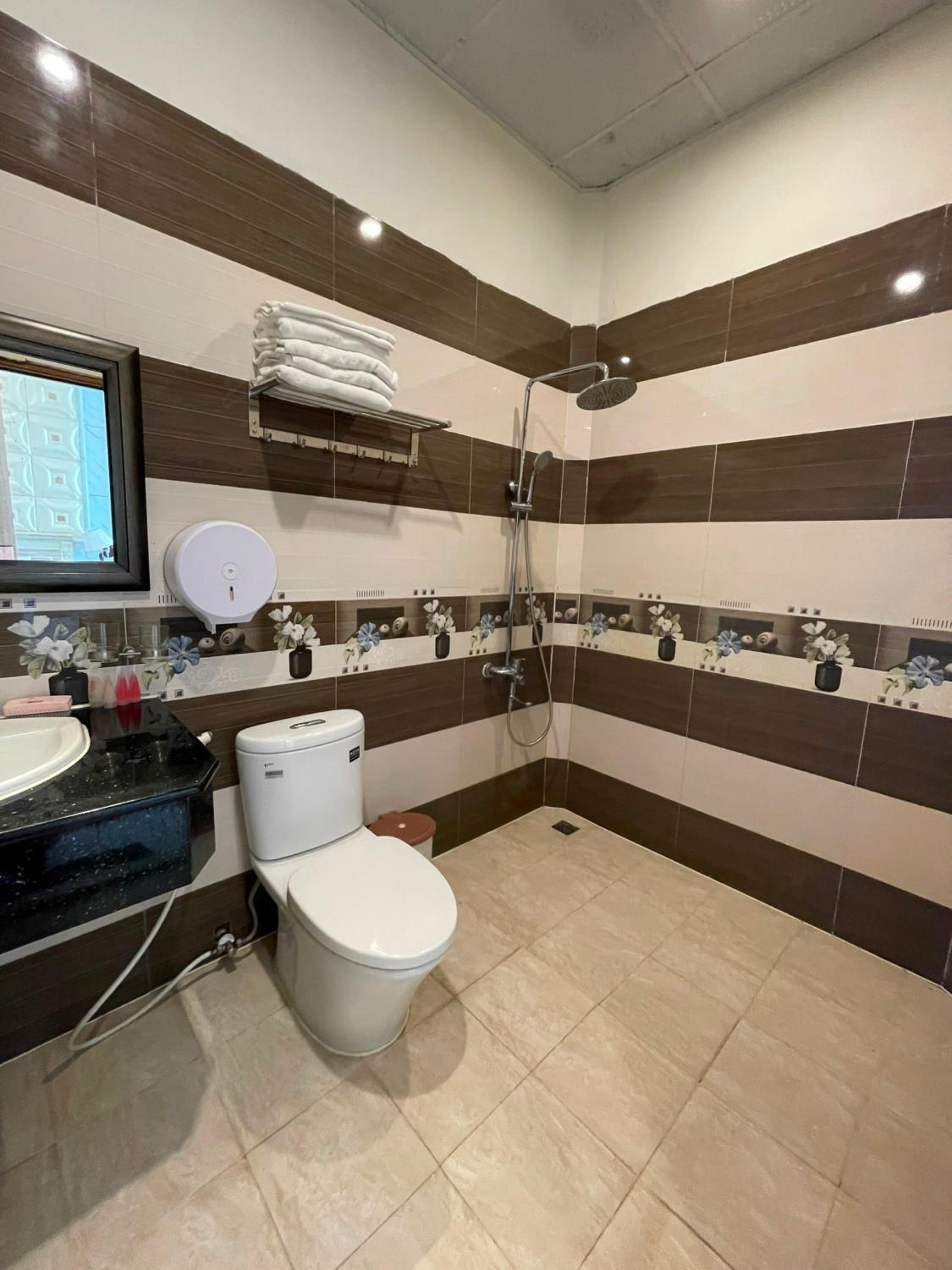 Deluxe Quadruple Room - Photo 9
