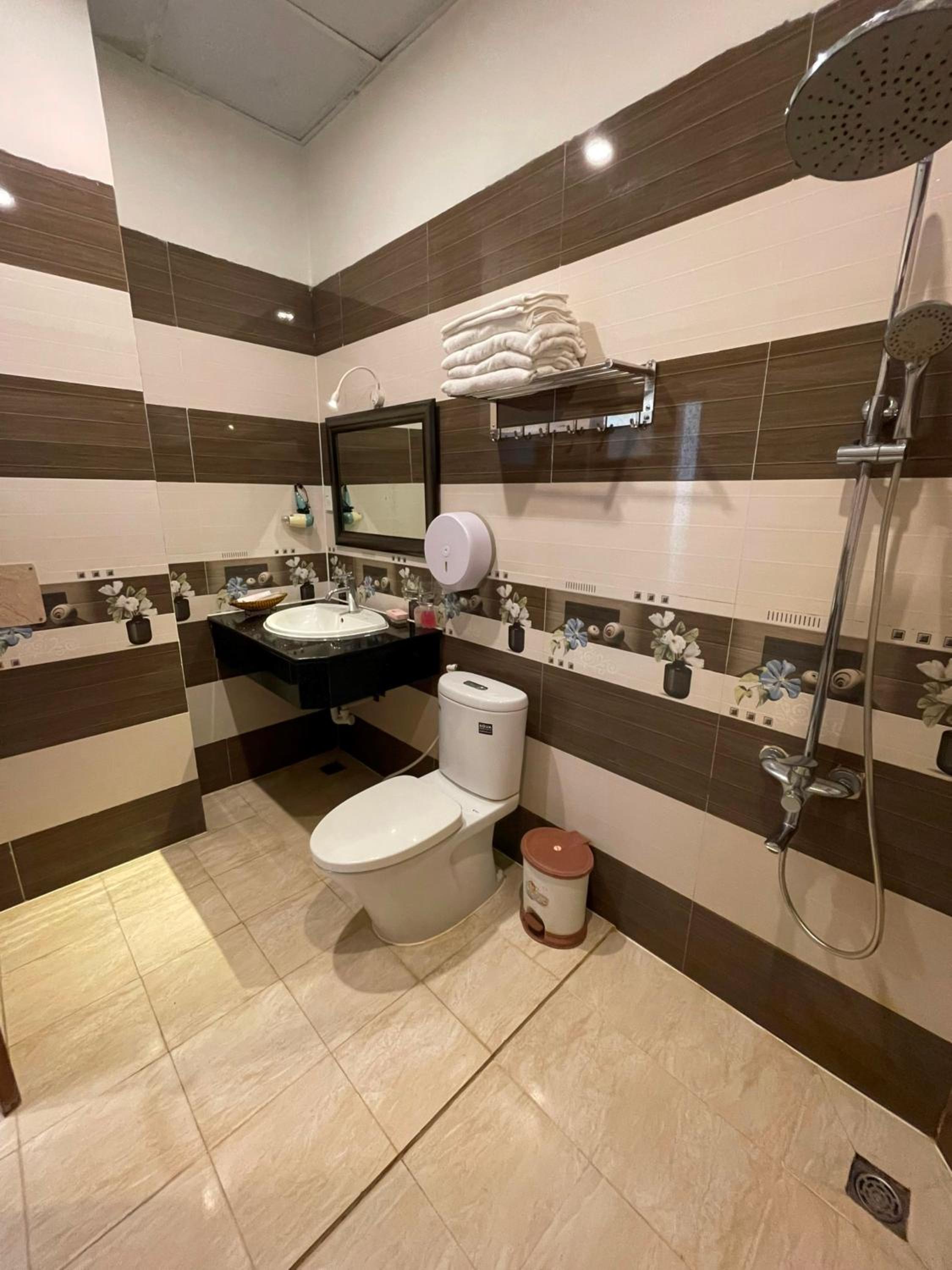 Deluxe Quadruple Room - Photo 8