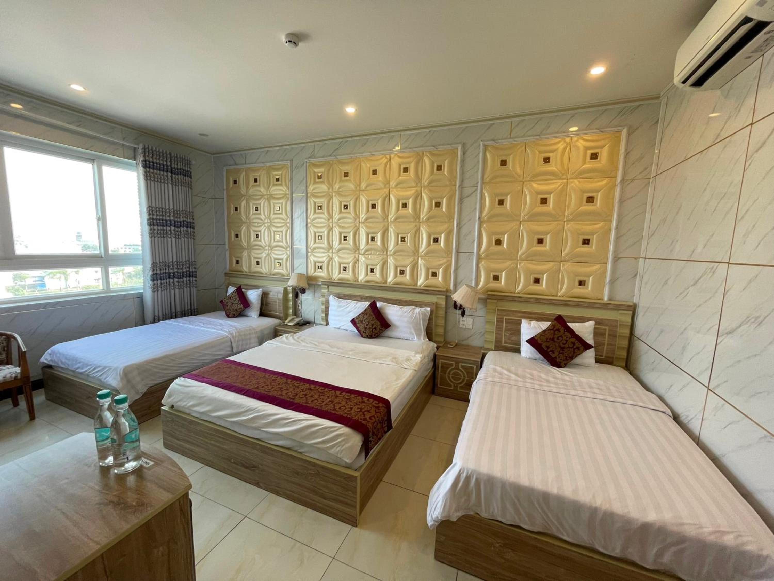 Deluxe Quadruple Room - Photo 4