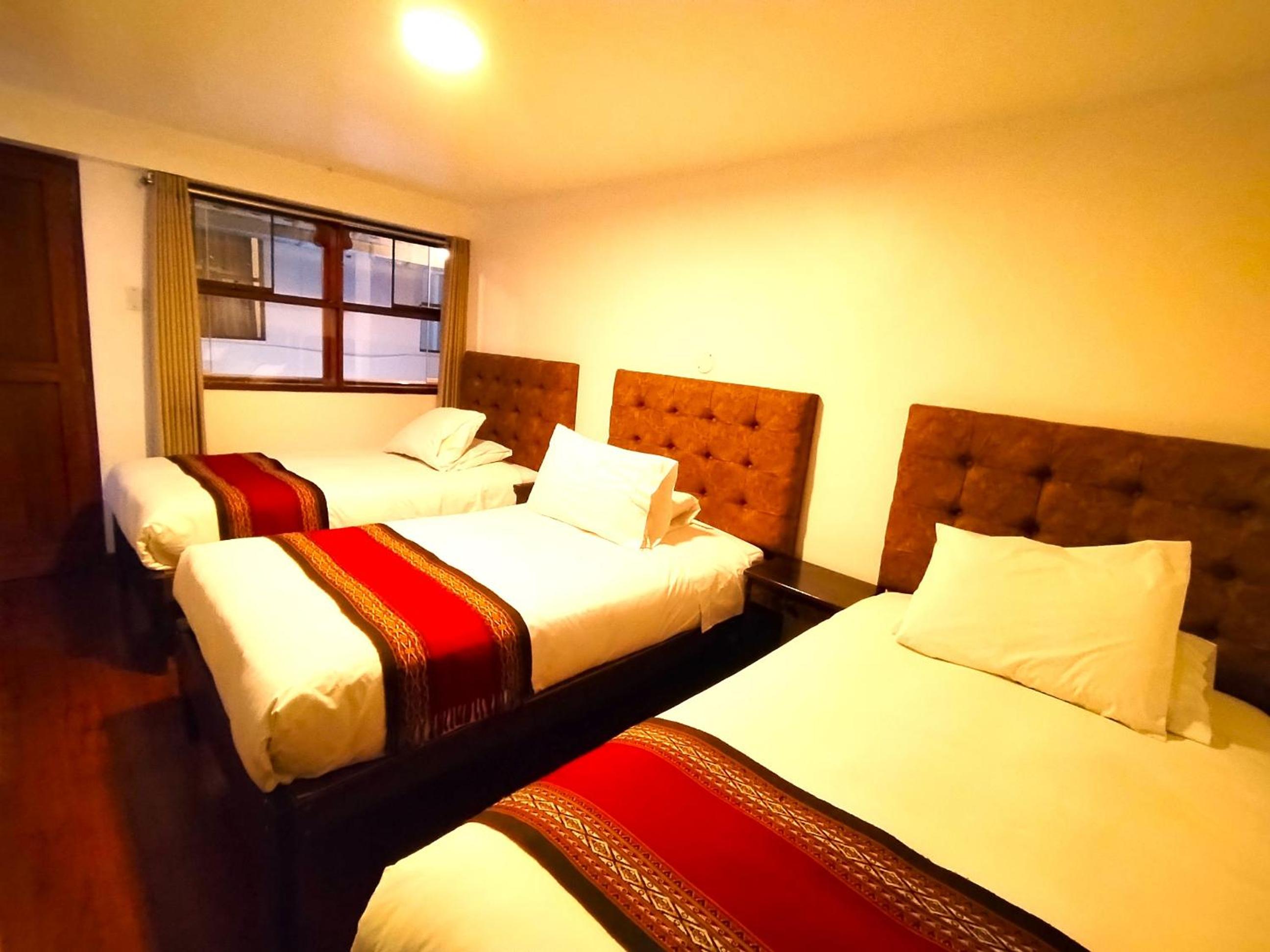 Economy Triple Room photo 1