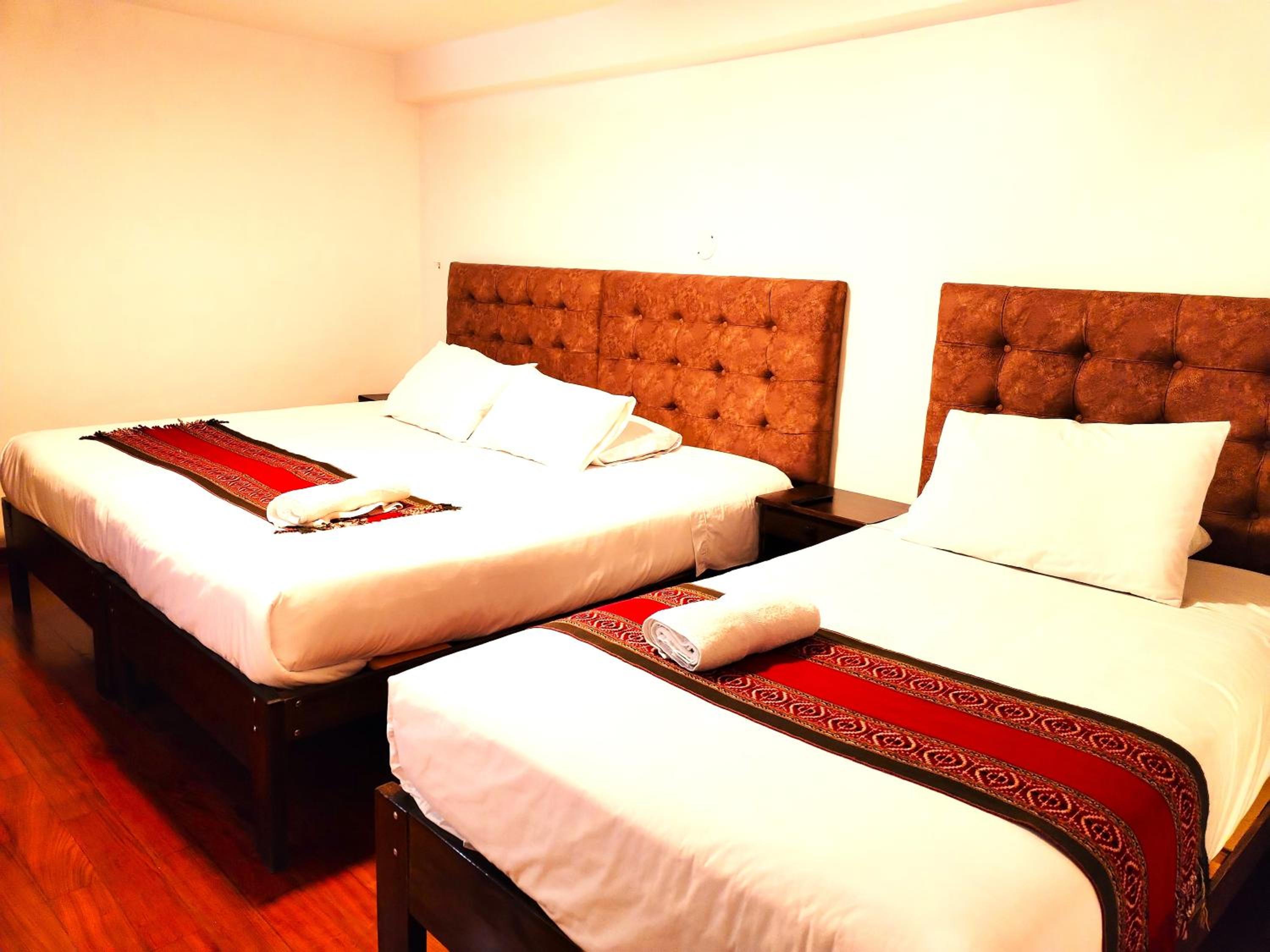 Economy Triple Room photo 2