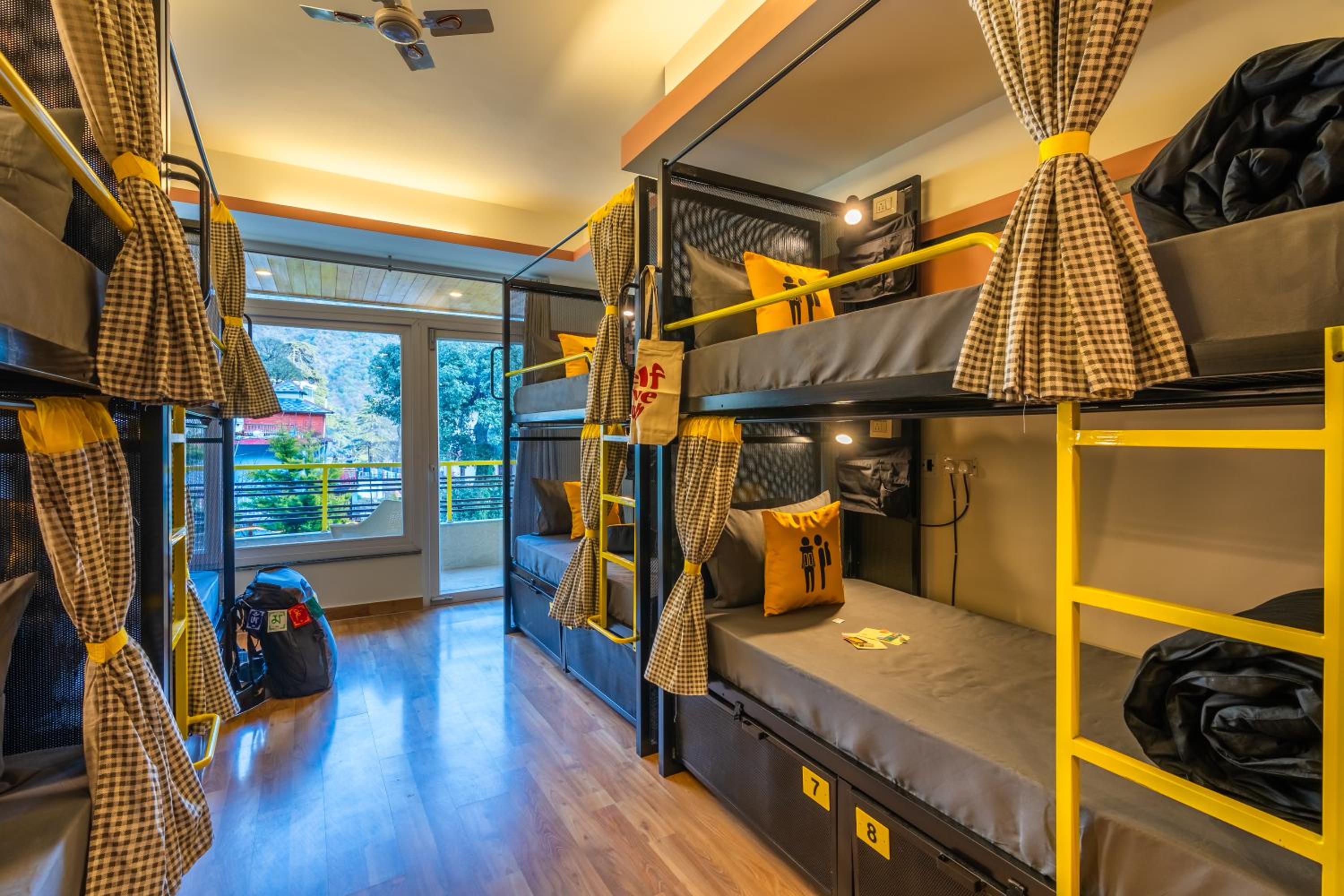 Bed in 8 Bed Mixed Dormitory with Balcony and Mountain View, photo 6