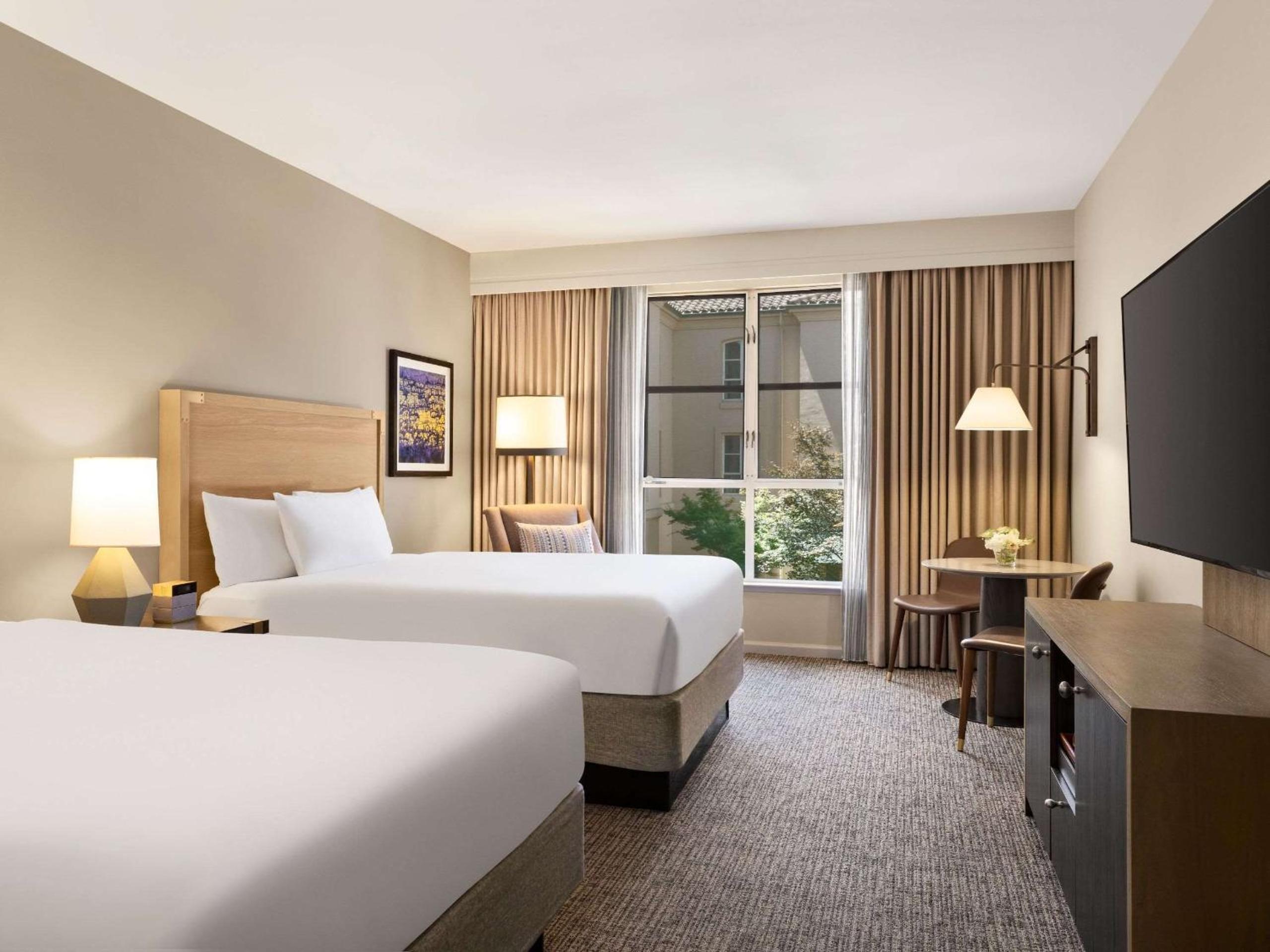 Queen Room with Two Queen Beds and Courtyard View - Photo 1