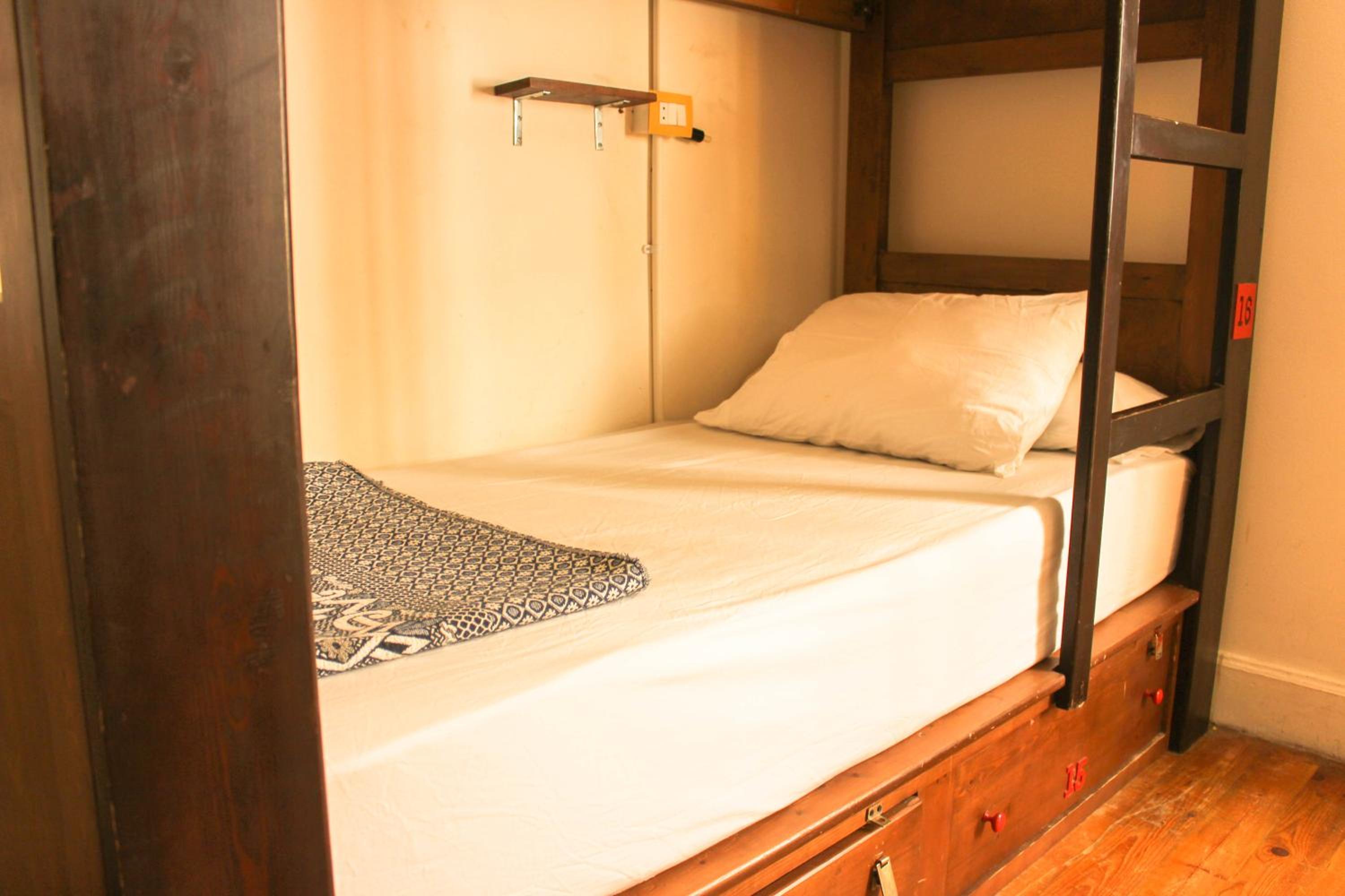 Bed in 6-Bed Male Dormitory Room (City view)